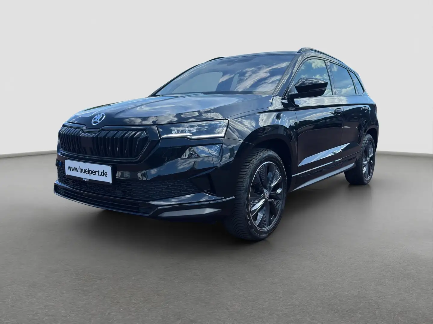 Skoda Karoq 2.0 SPORTLINE 4X4 PANO AHK CAM LM18 NAVI Schwarz - 2