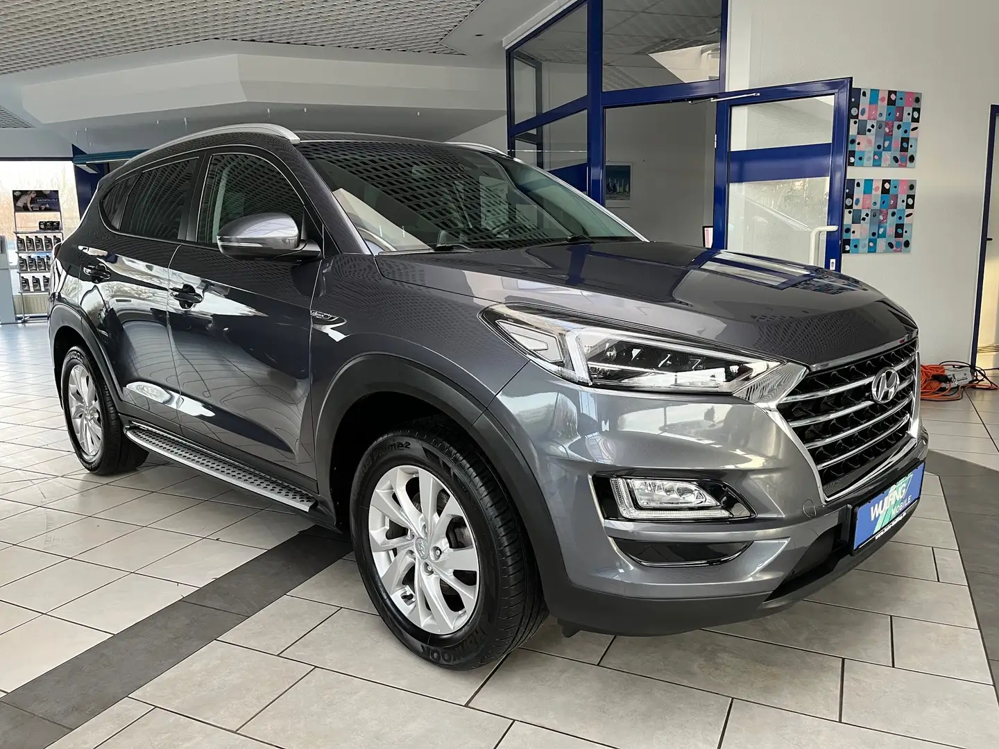 Hyundai TUCSON 1.6 GDI Trend,LED-SW,Navi,Totwinkel Gris - 1