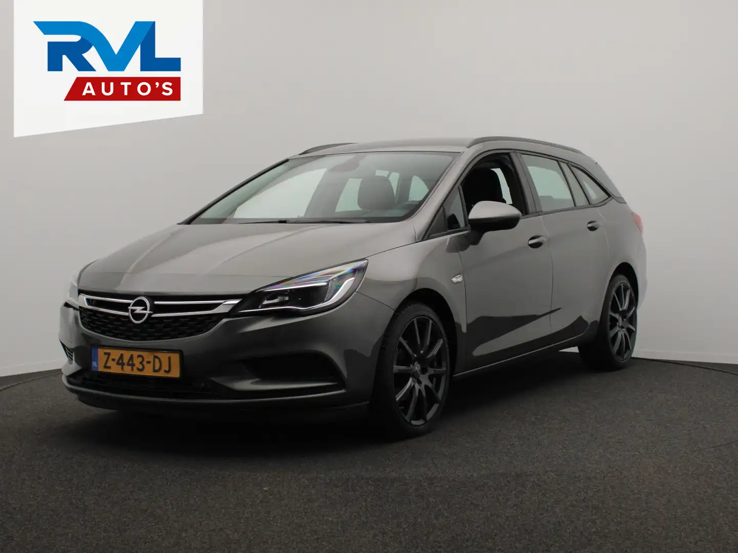 Opel Astra Sports Tourer 1.6 CDTI Business+ Navigatie Cruise Grijs - 1