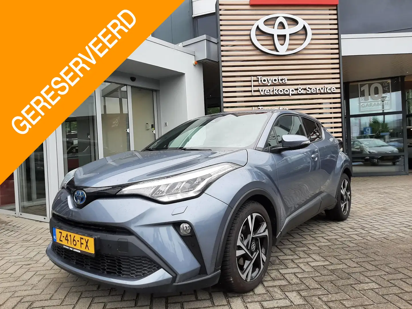 Toyota C-HR 1.8 HYBRID DYNAMIC TREKHAAK NAVI STOEL/STUURVERW P Grijs - 1