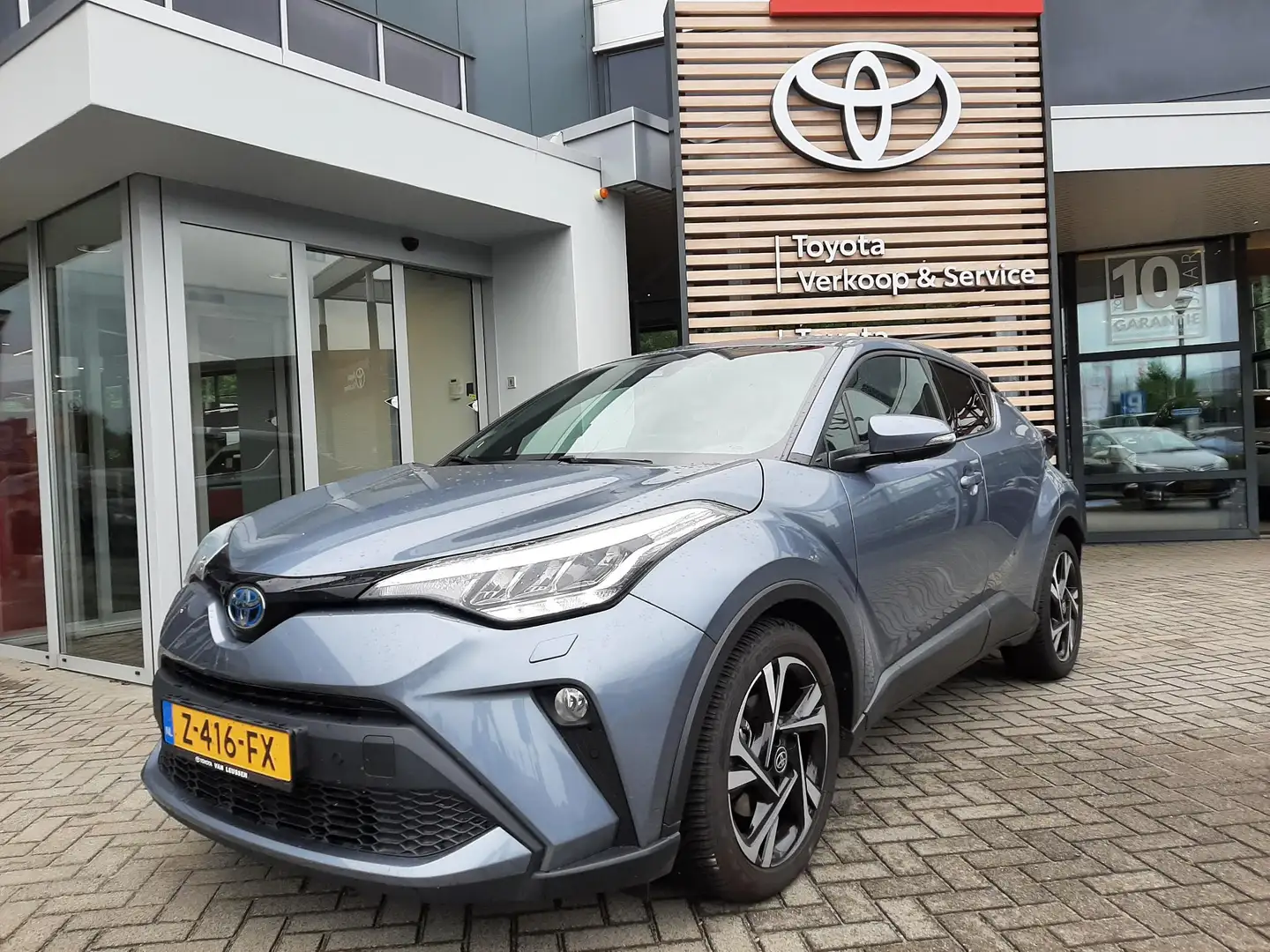 Toyota C-HR 1.8 HYBRID DYNAMIC TREKHAAK NAVI STOEL/STUURVERW P Grijs - 1