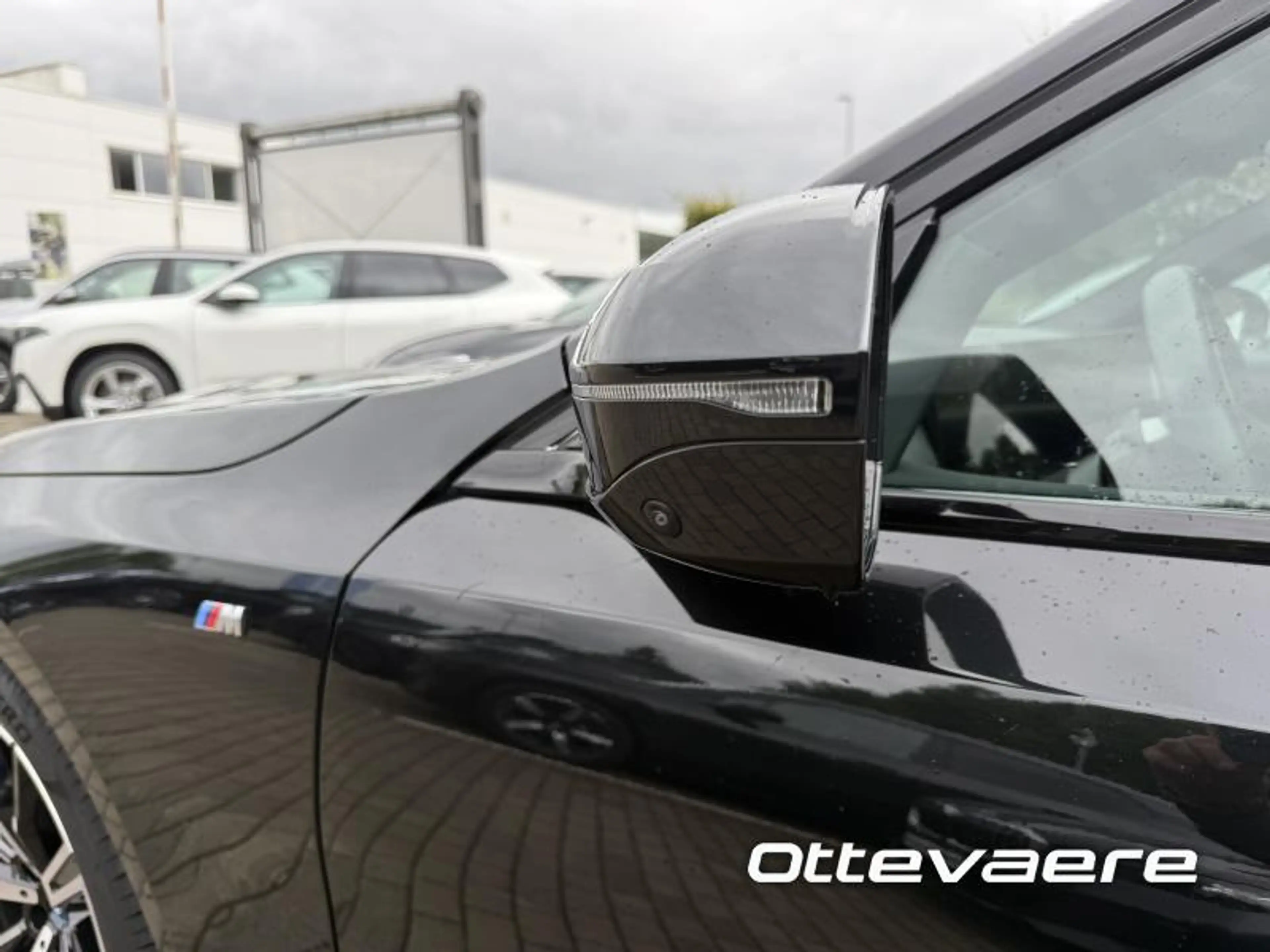 BMW i5 Touring — photo 8