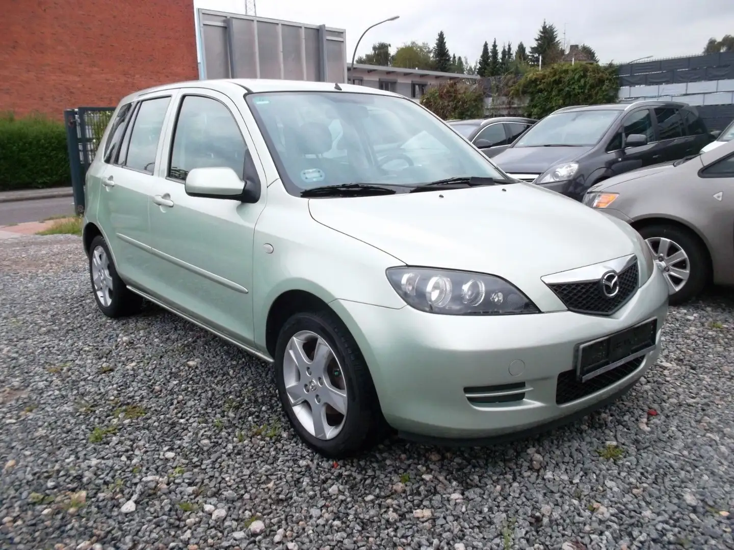Mazda 2 Lim. 1.4 Active, Automatik, 1.HAND Grün - 1