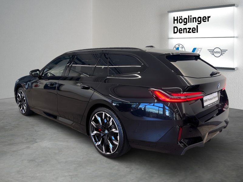 BMW 550 e xDrive — photo 10