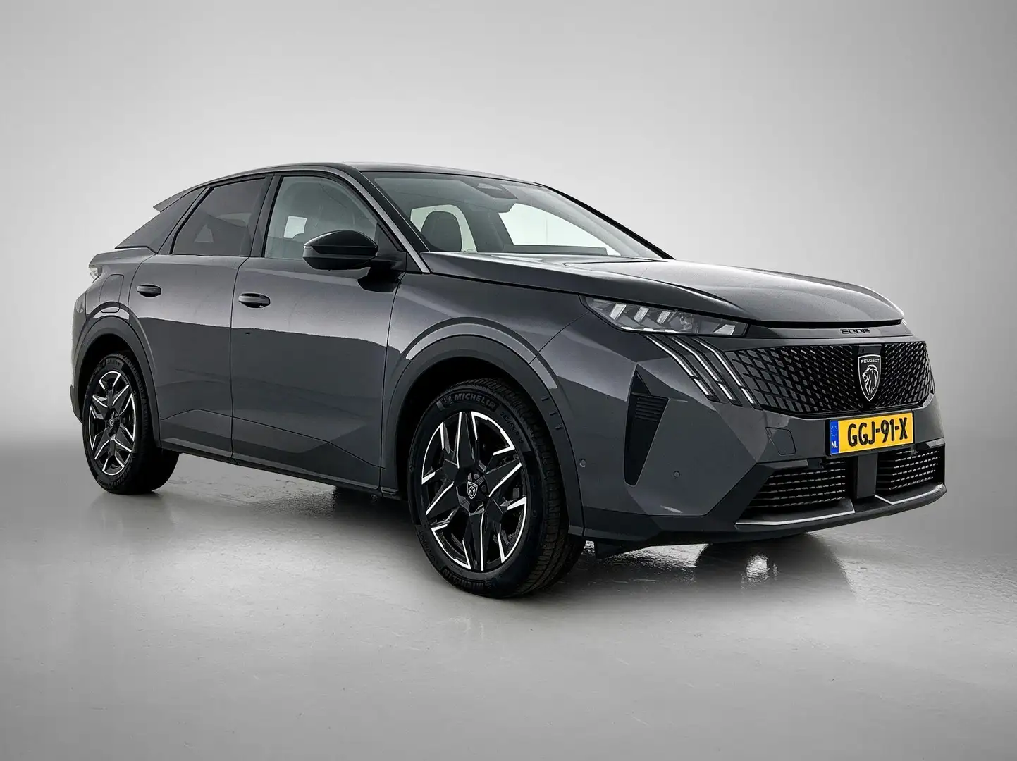 Peugeot 3008 1.2 Hybrid 136 GT | Navigatie | Rondomzicht Camera Grijs - 2