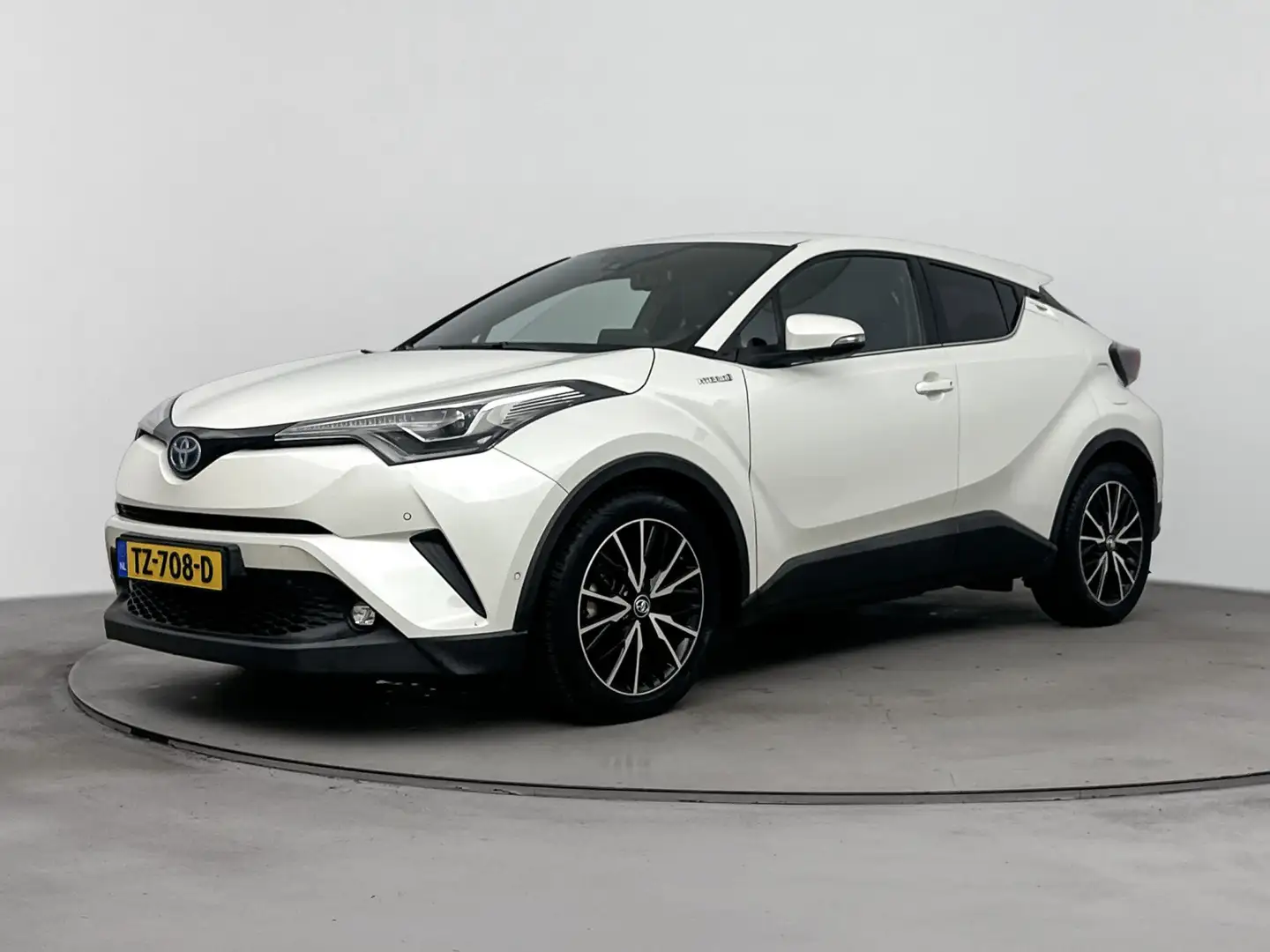 Toyota C-HR 1.8 Hybrid Bi-Tone | Stoelverwarming | Half leder/ Wit - 1