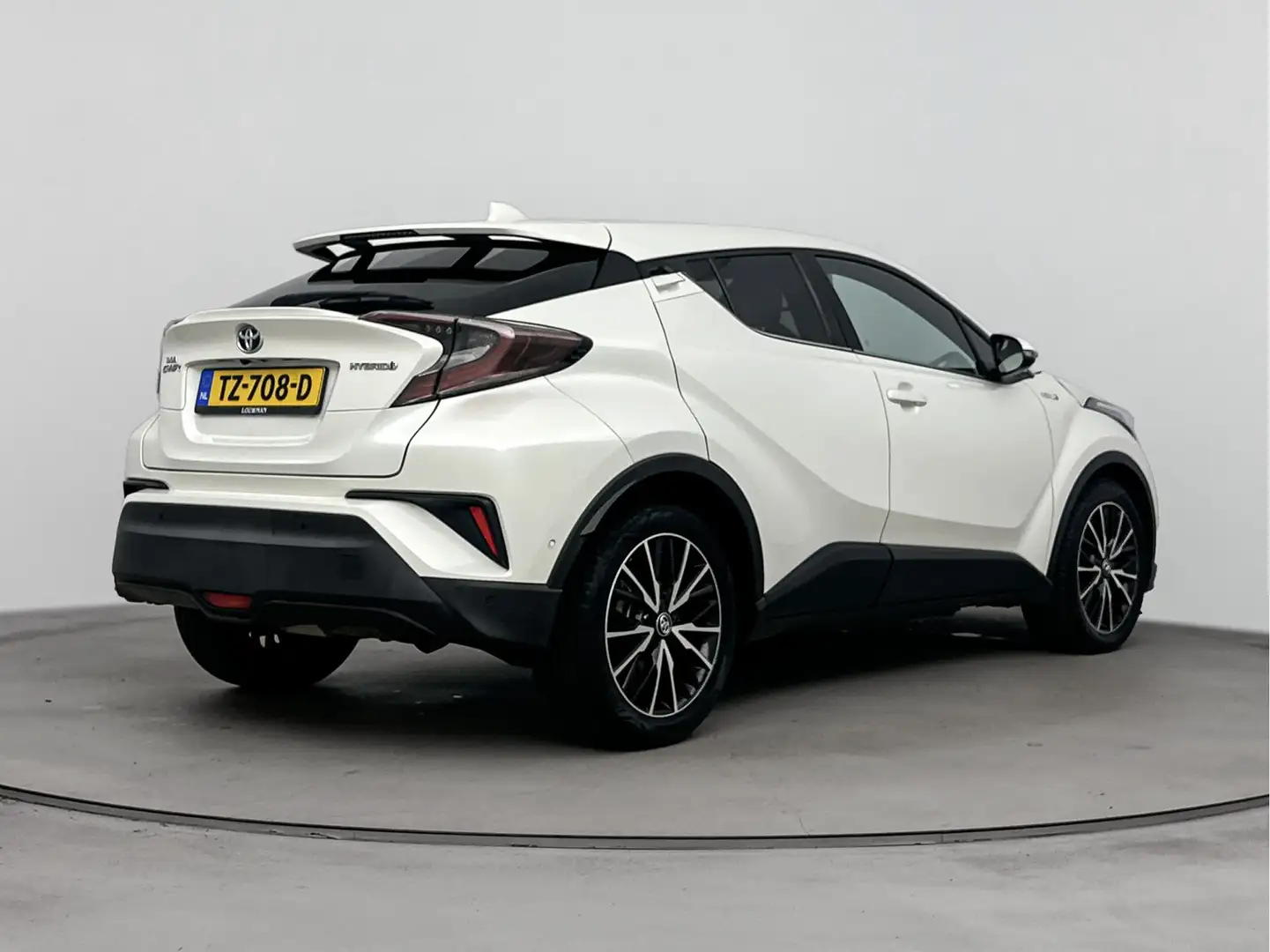 Toyota C-HR 1.8 Hybrid Bi-Tone | Stoelverwarming | Half leder/ Wit - 2