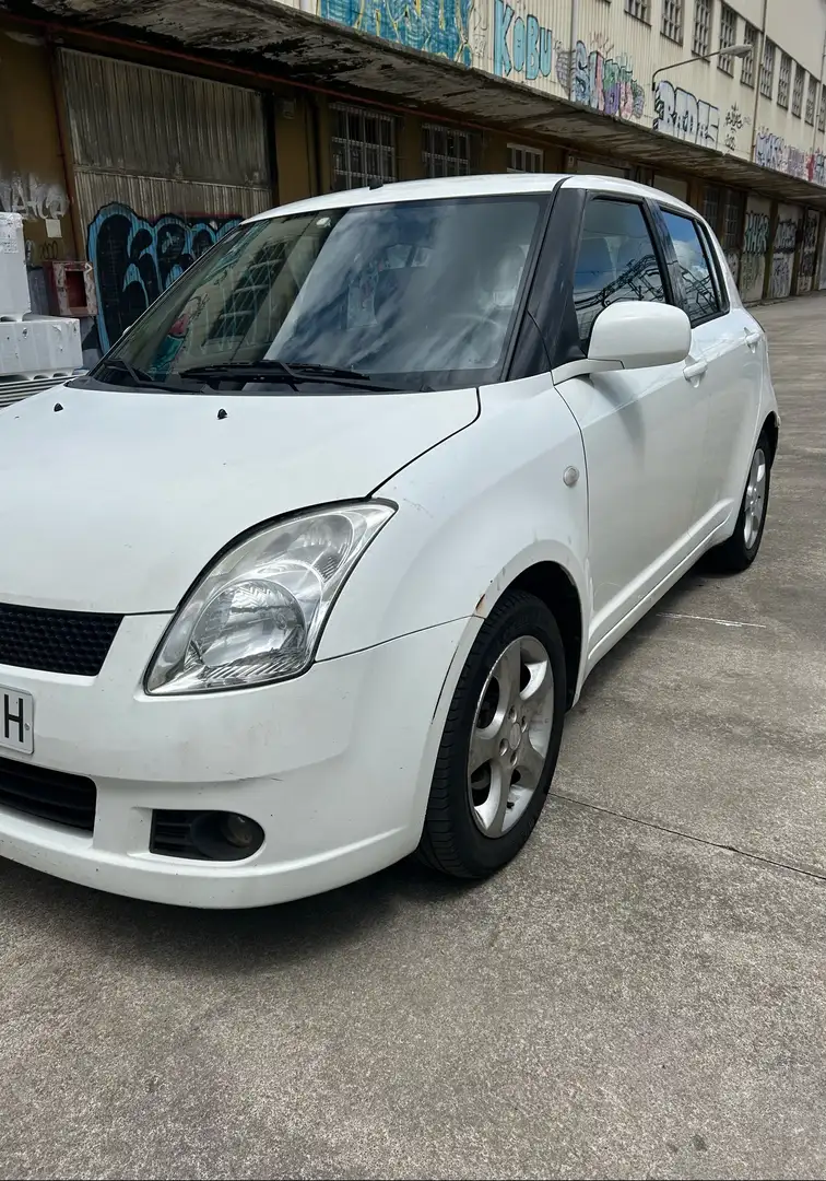 Suzuki Swift 1.3DDiS GL - 1
