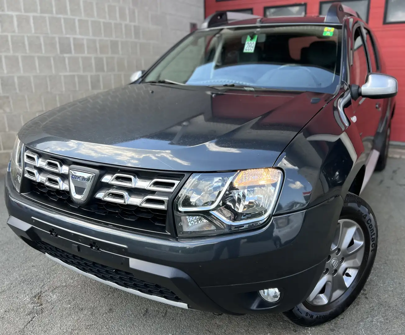 Dacia Duster 1.2 TCe 4x2 Prestige + NAVI + CAMÉRA + CLIM + CUI Gris - 1