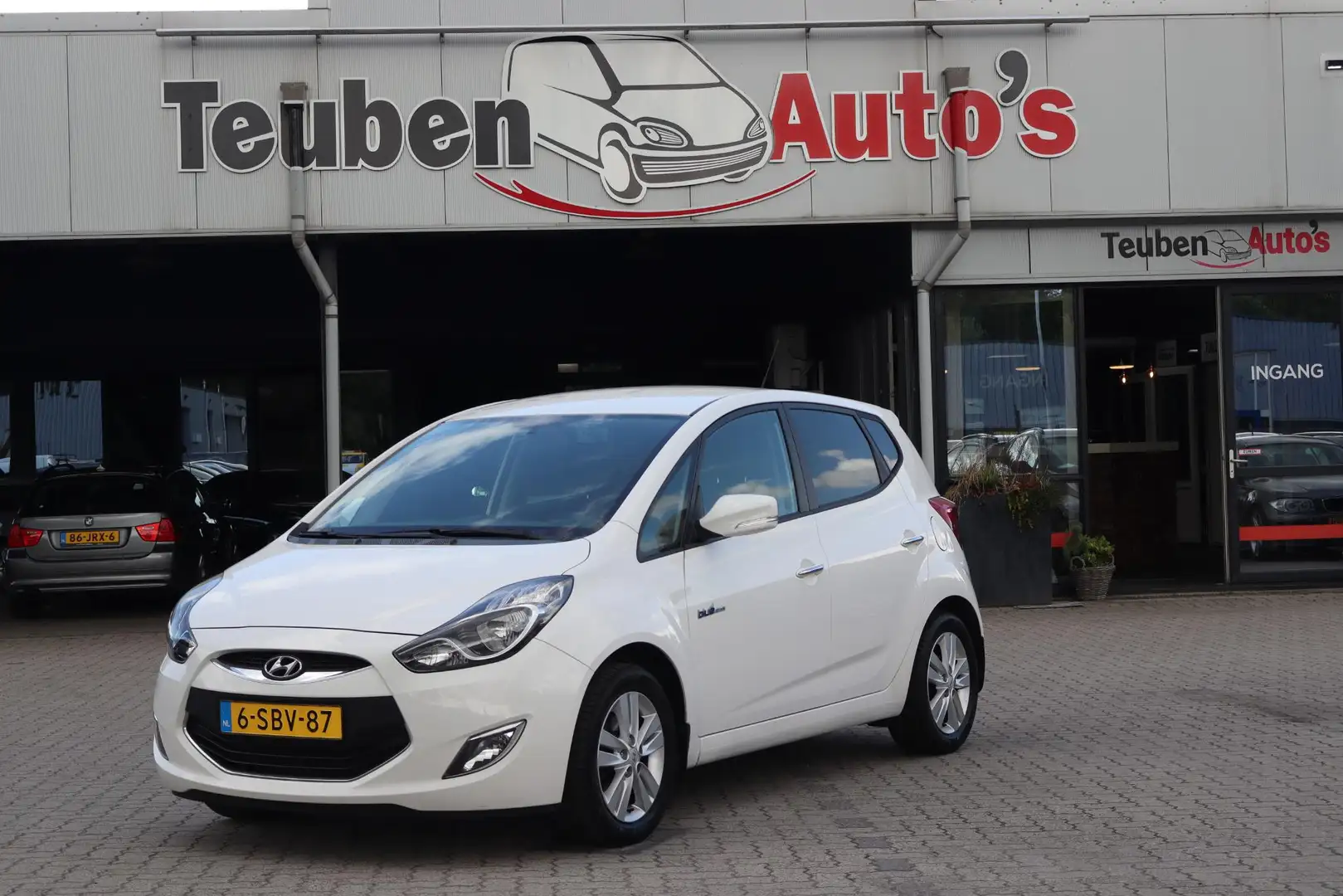 Hyundai iX20 1.4i i-Magine Navigatie, Camera, Trekhaak, Airco, Wit - 1