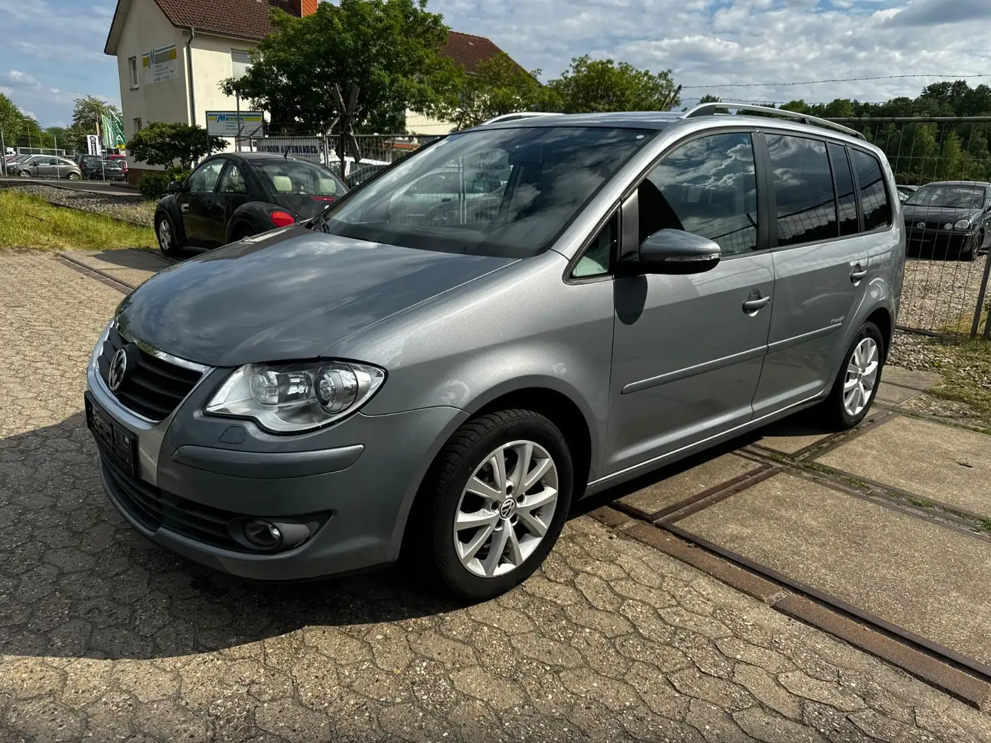 Volkswagen Touran Freestyle*Bi-Xenon*Navi*Automatik*AHK* Grau - 1