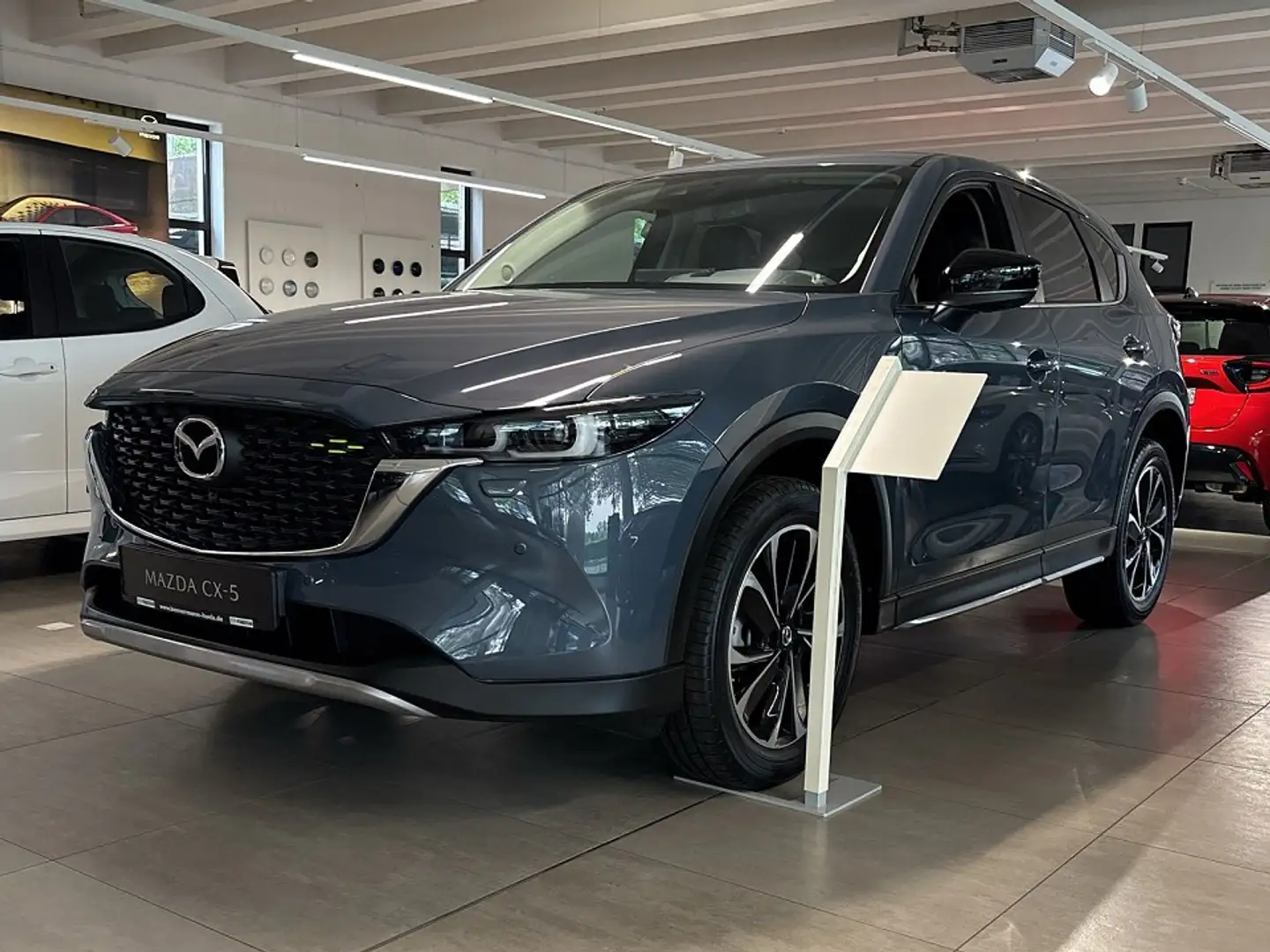 Mazda CX-5 2.5 M Hybrid NEWGROUND *Klimaautomatik*Navi*360°* Szürke - 1