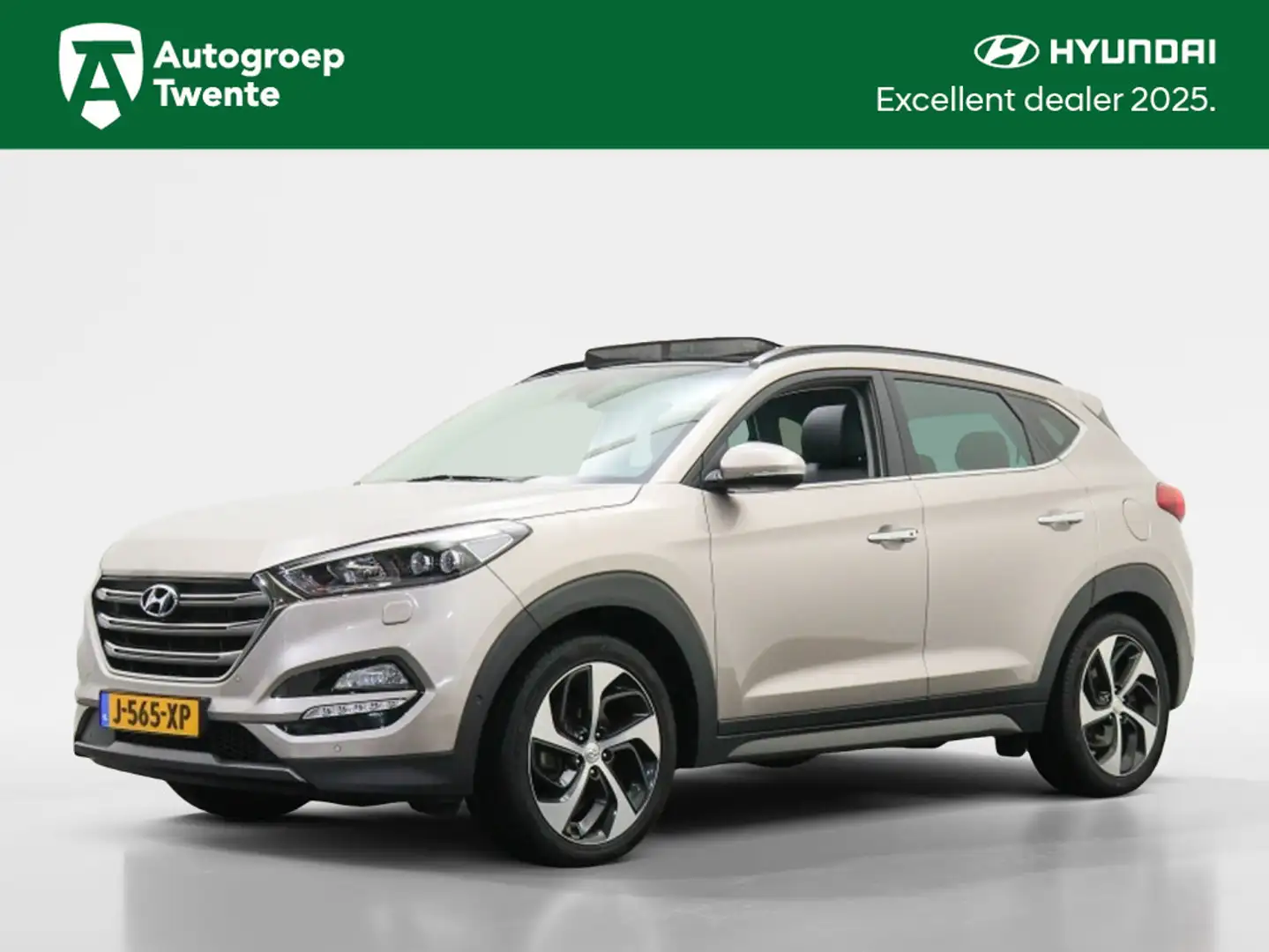 Hyundai TUCSON 1.6 T-GDi 177PK Premium 4WD Automaat | Panoramadak Grigio - 1