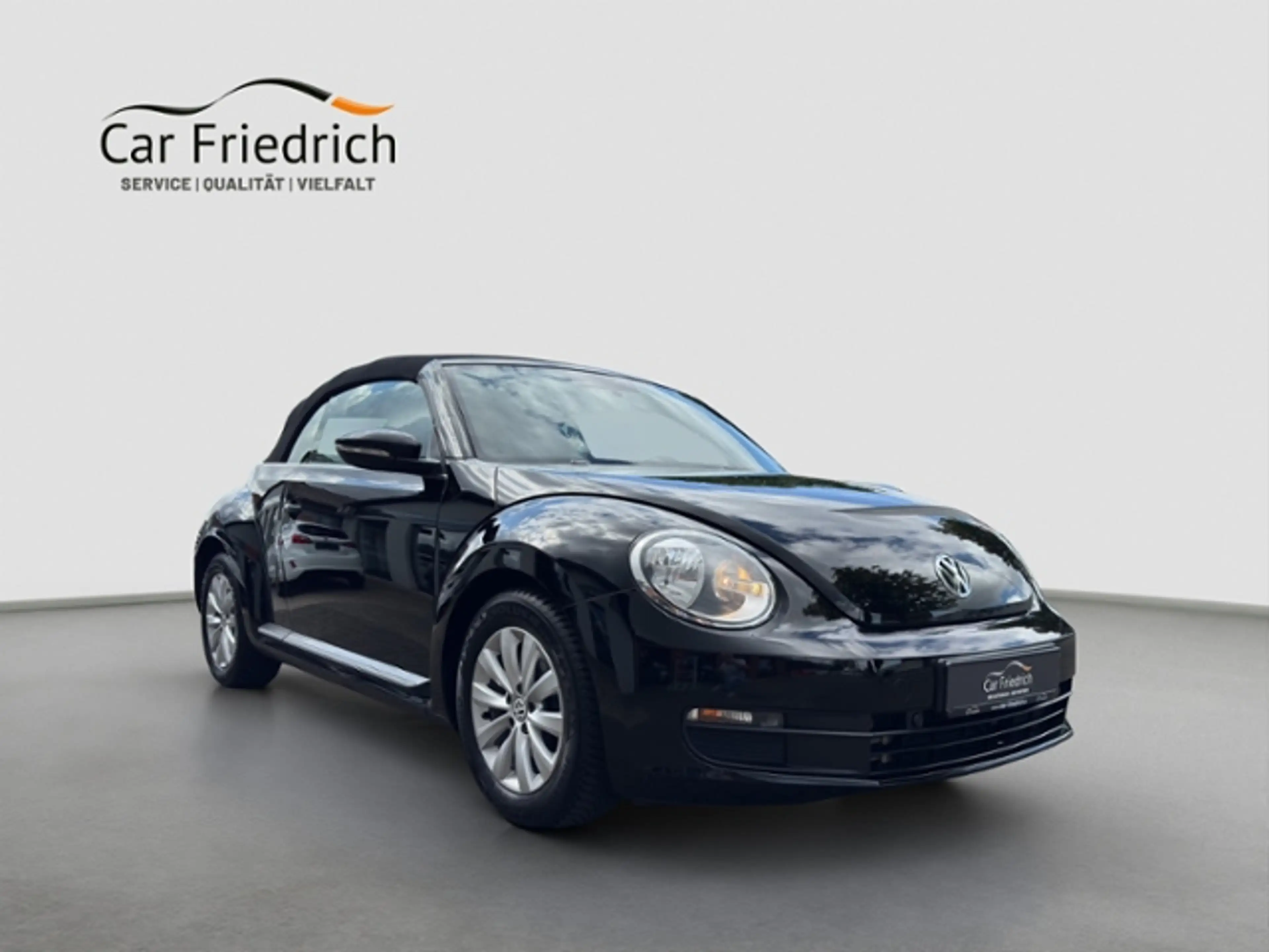 Volkswagen Beetle Cabriolet 1,2 l TSI — photo 3