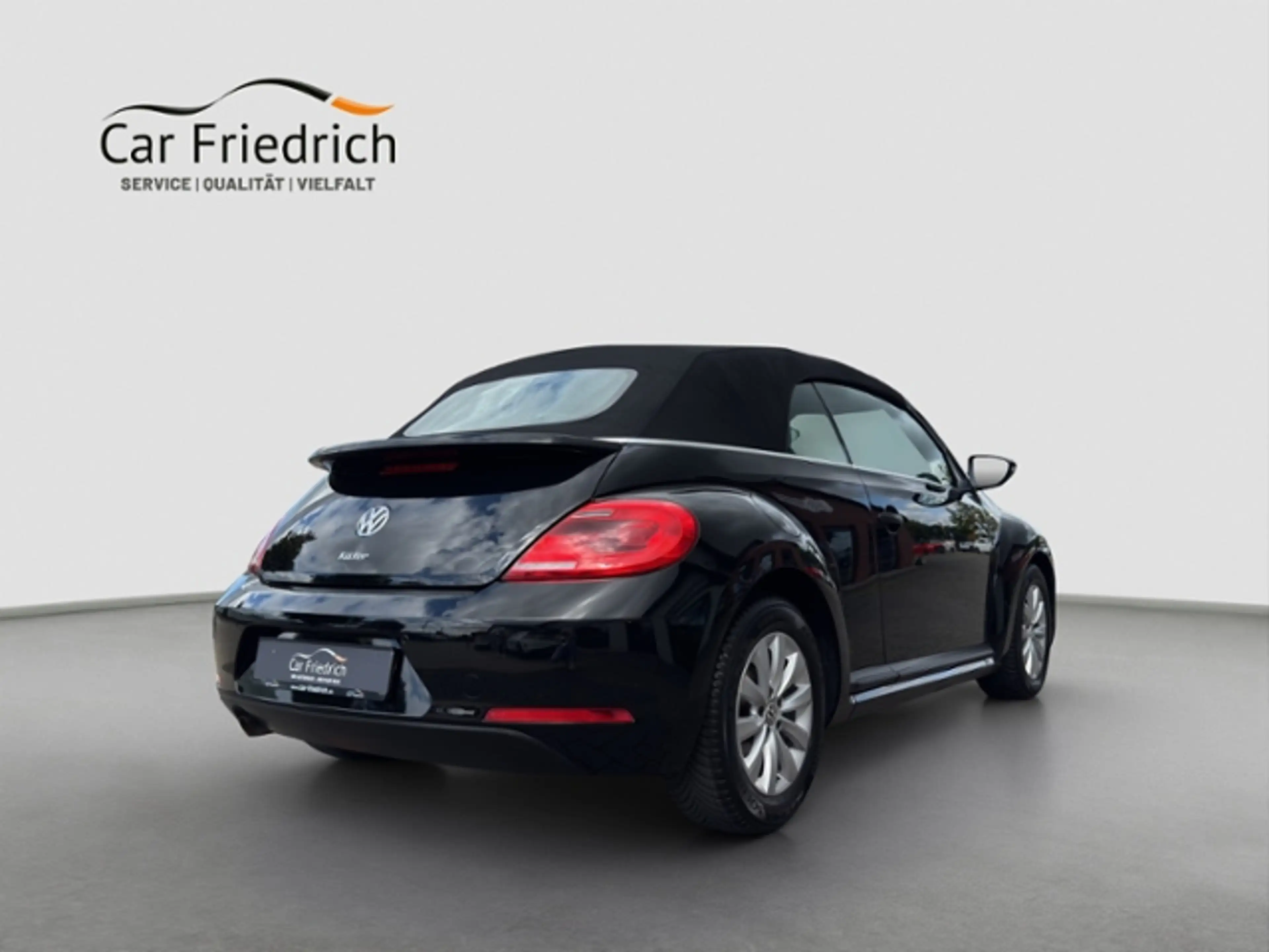 Volkswagen Beetle Cabriolet 1,2 l TSI — photo 8