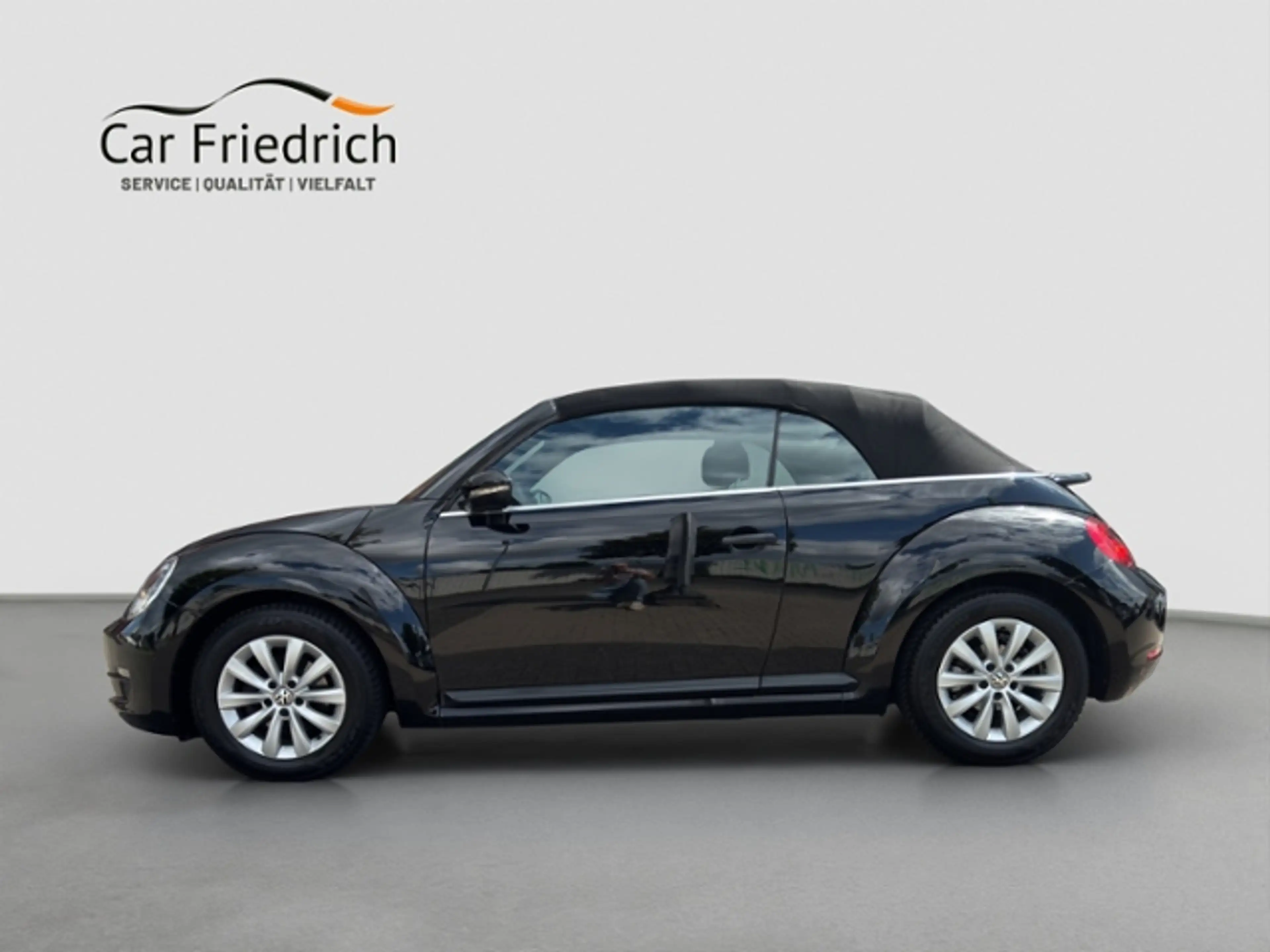 Volkswagen Beetle Cabriolet 1,2 l TSI — photo 11
