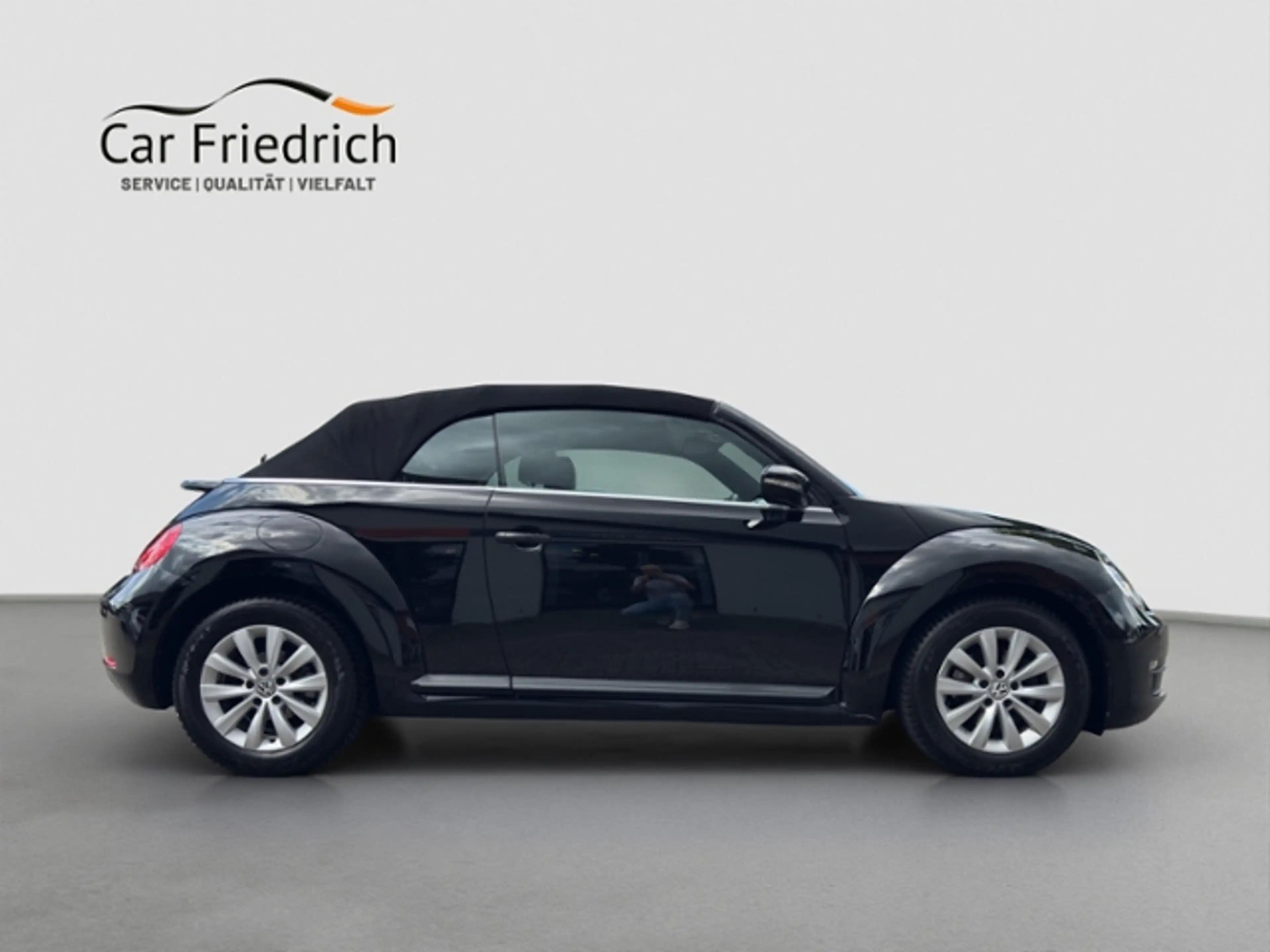 Volkswagen Beetle Cabriolet 1,2 l TSI — photo 4