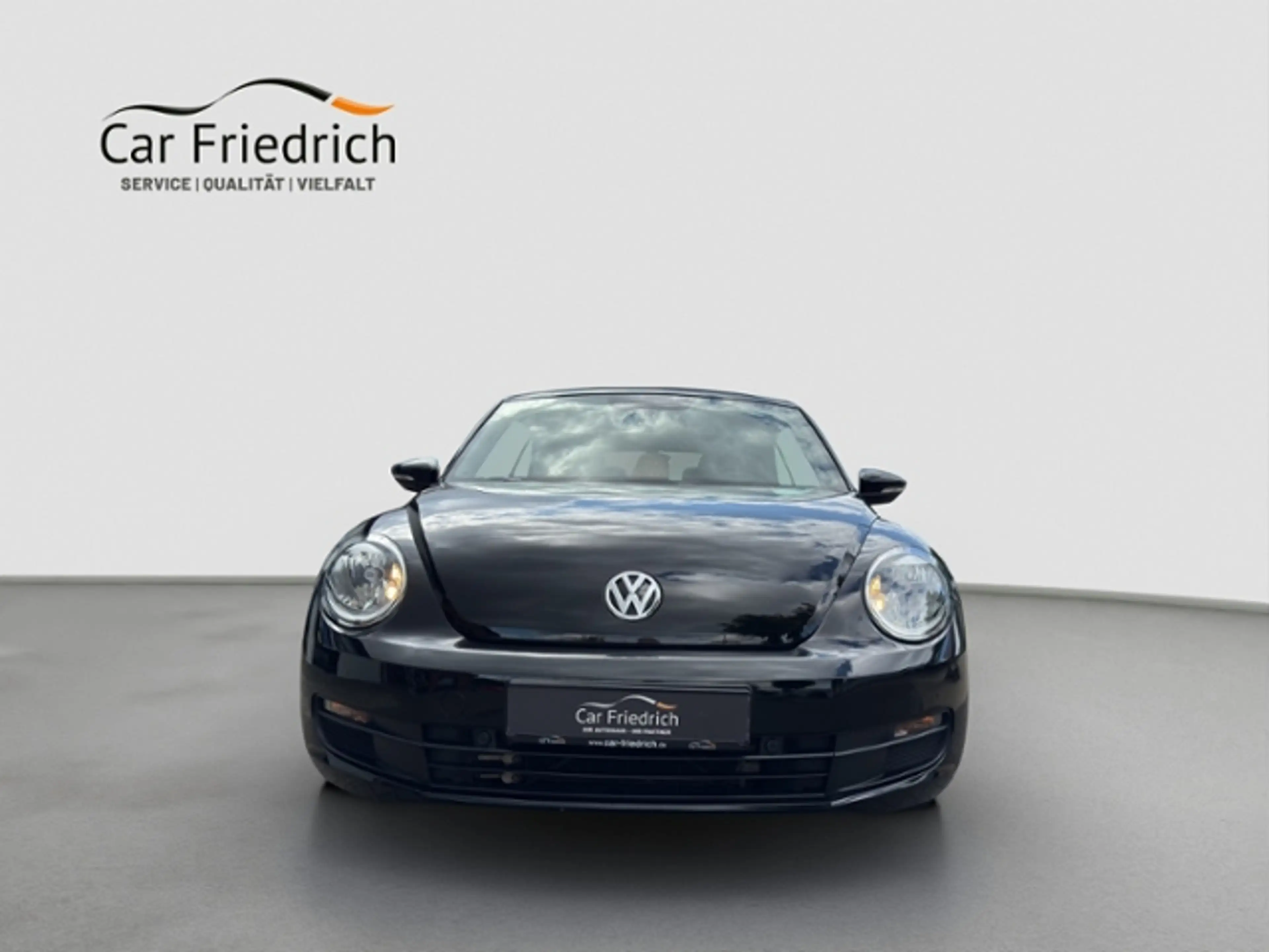 Volkswagen Beetle Cabriolet 1,2 l TSI — photo 5