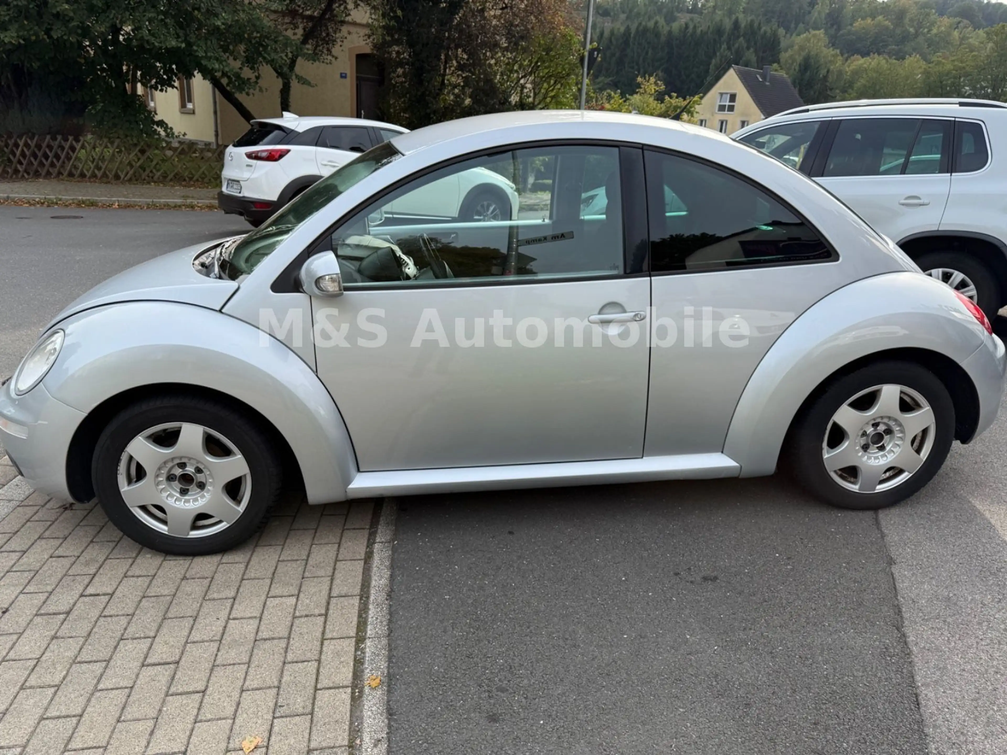 Volkswagen New Beetle 1.9 Klima,SHZ.PDC,Tüv — photo 8