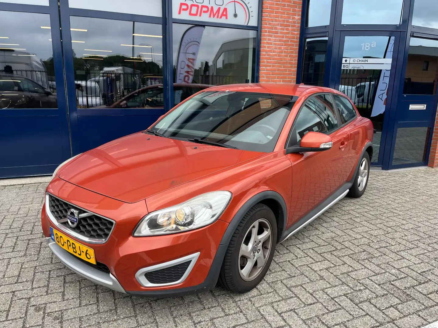 Volvo C30 1.6 101pk Advantage / Automatische ijskoude airco Oranje - 1