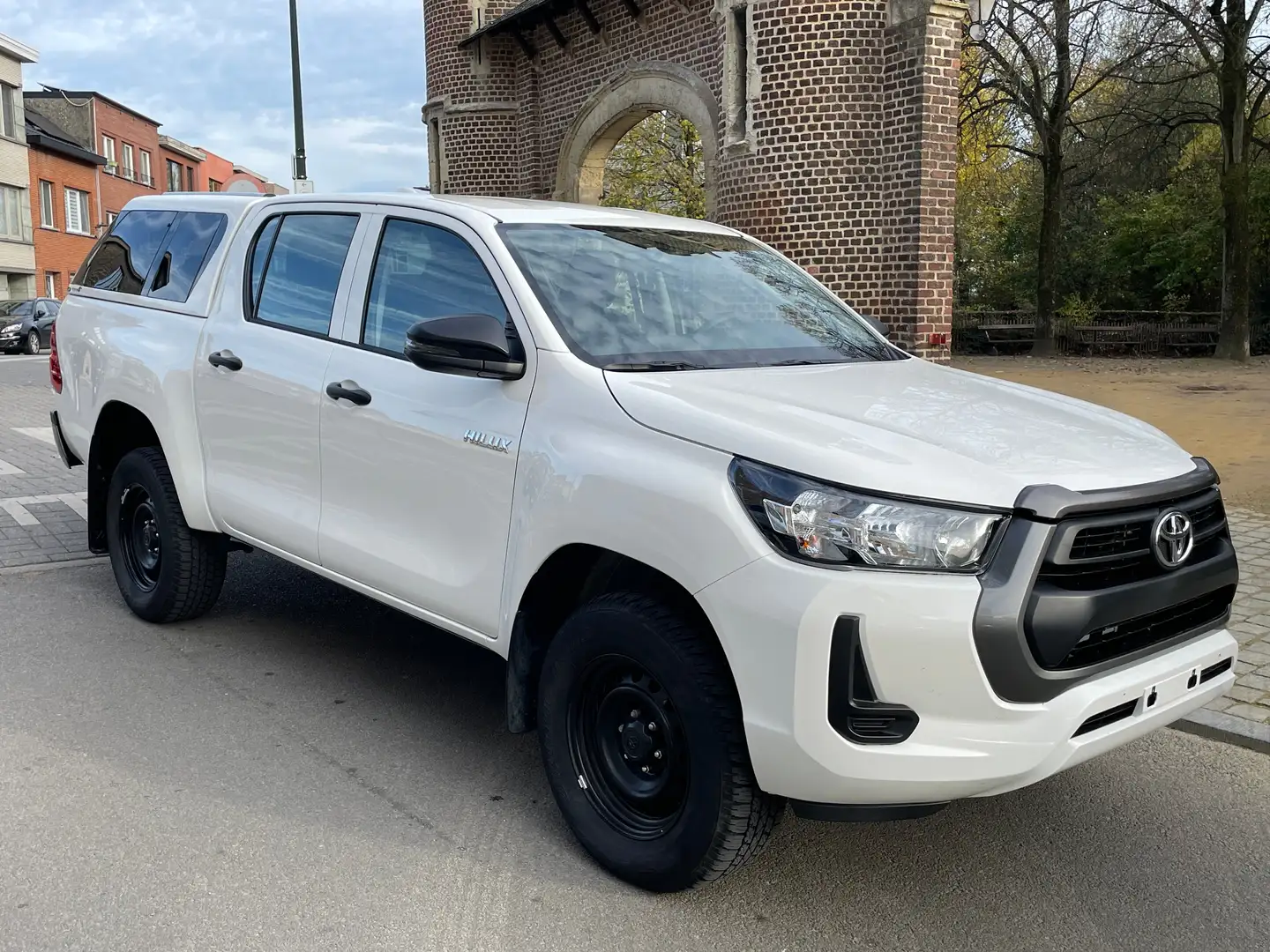 Toyota Hilux 2.4 D-4D 4WD Comfort HTOP 15000 KM !!! 32900 HTVA Wit - 1