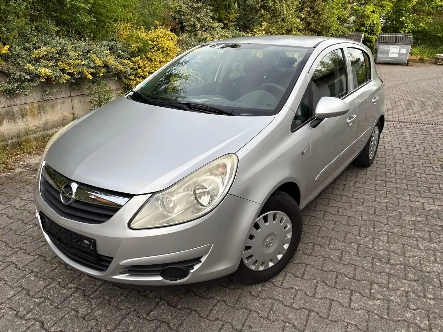 Opel Corsa 1.2 16V Серебристый - 1
