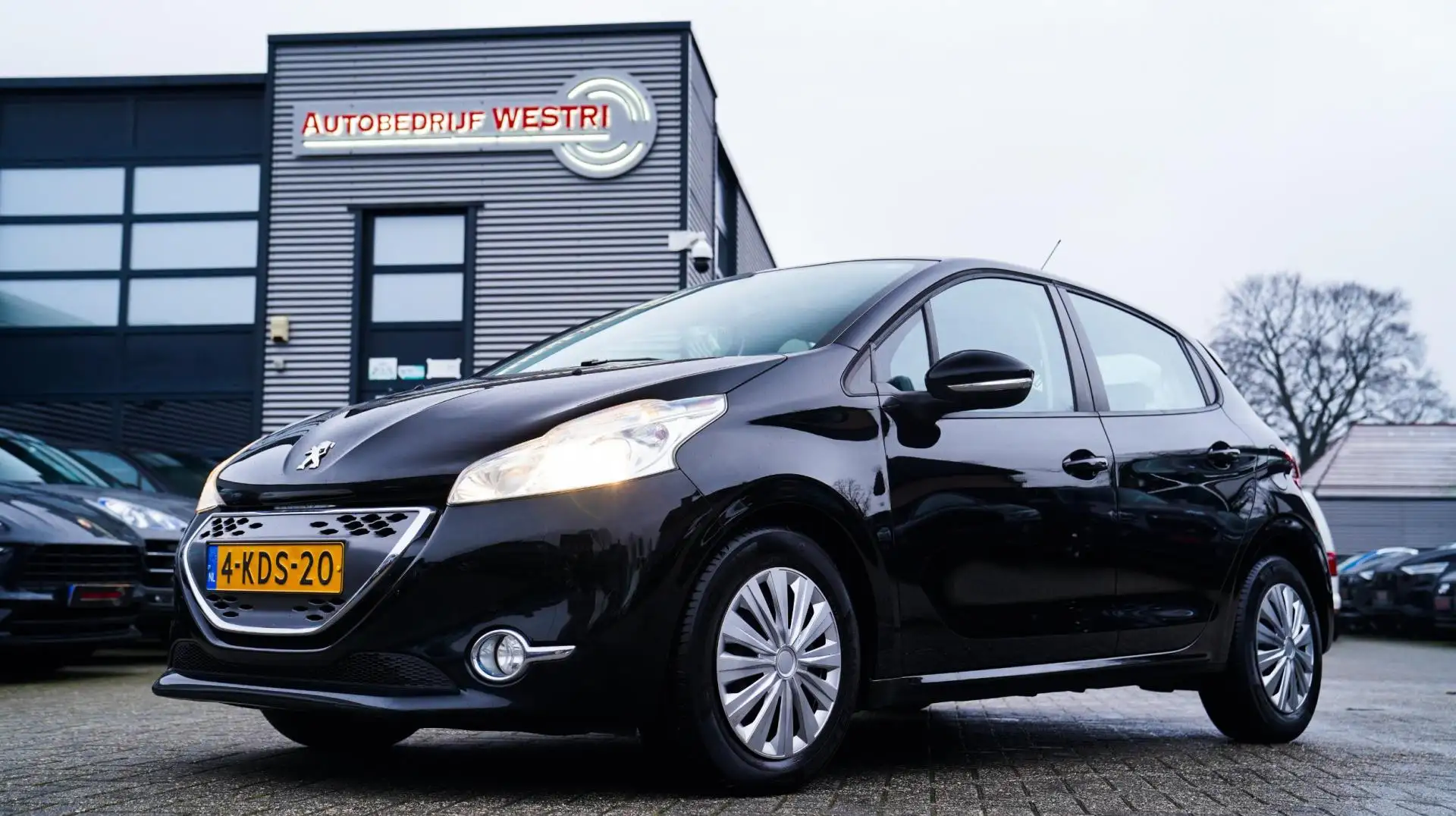 Peugeot 208 1.4 e-HDi Blue Lease | Navi | AC | Automaat Schwarz - 1