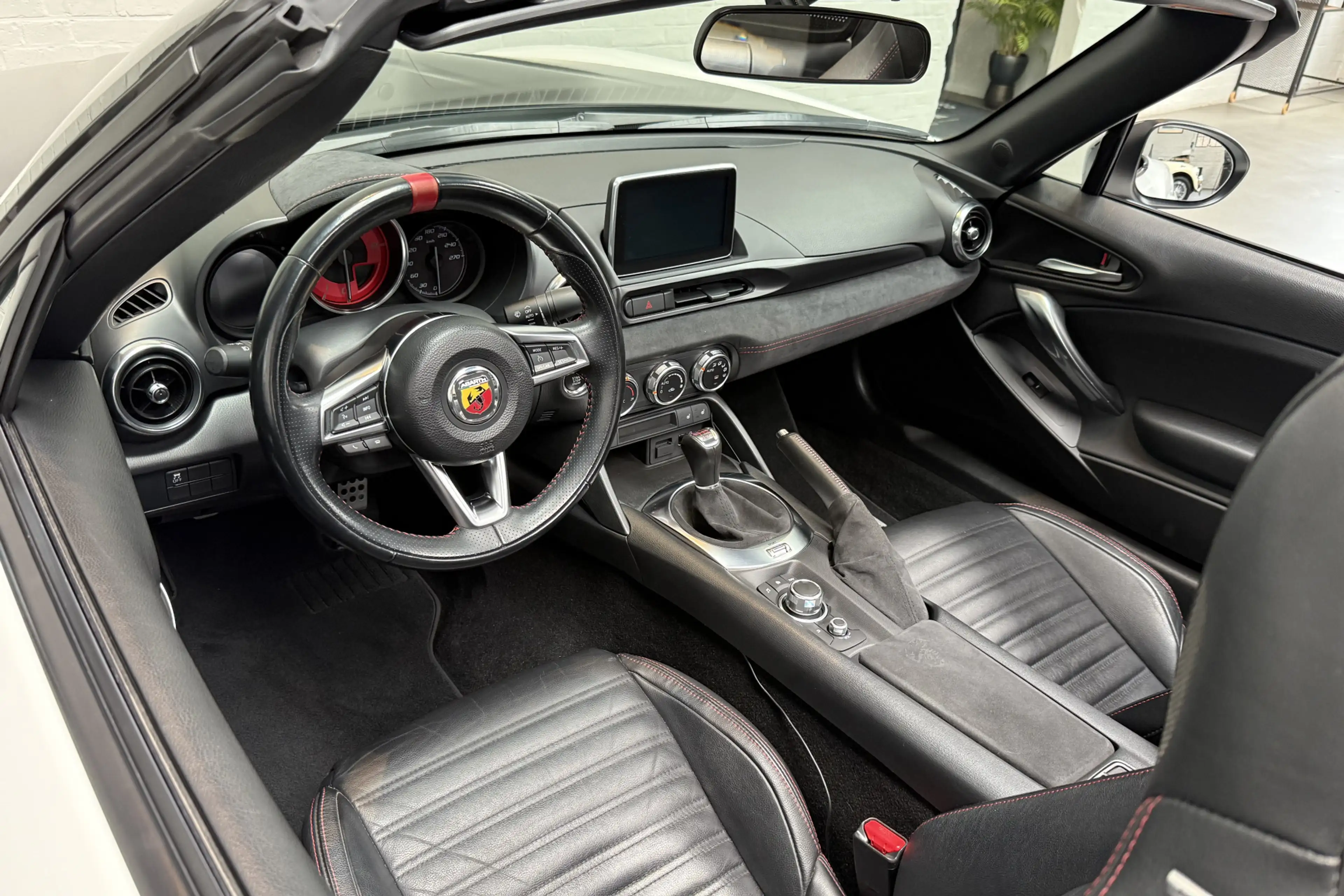 Fiat 124 Spider 1.4 MultiAir Turbo Abarth Scuderia Tuning — photo 8