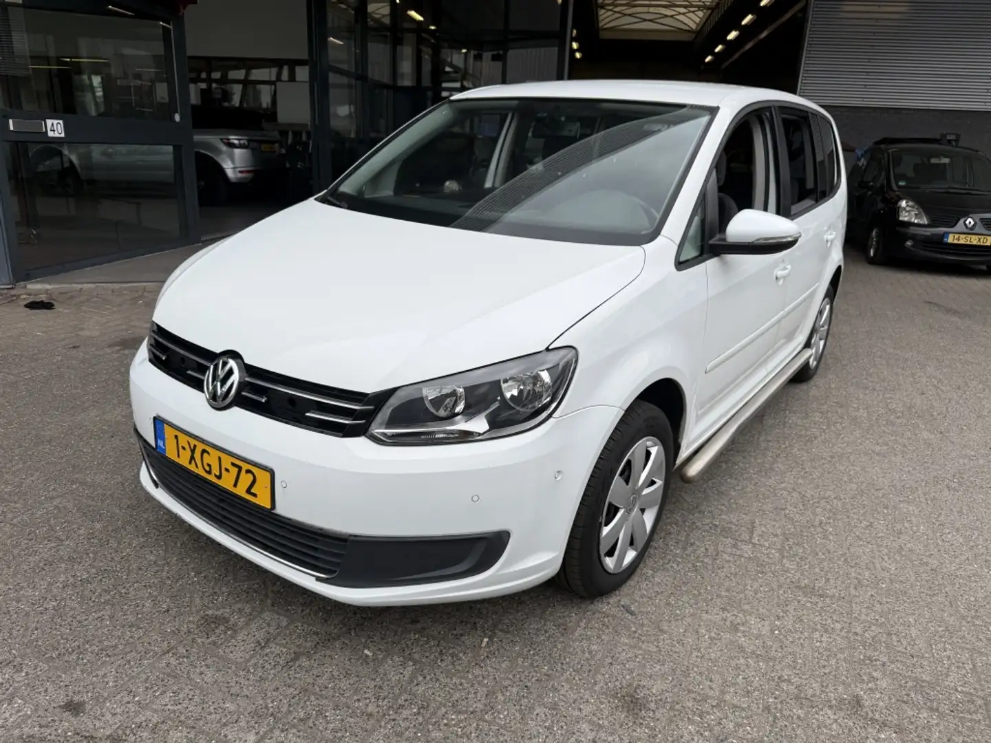 Volkswagen Touran 2.0 TDI Comfl. BlueM Wit - 1