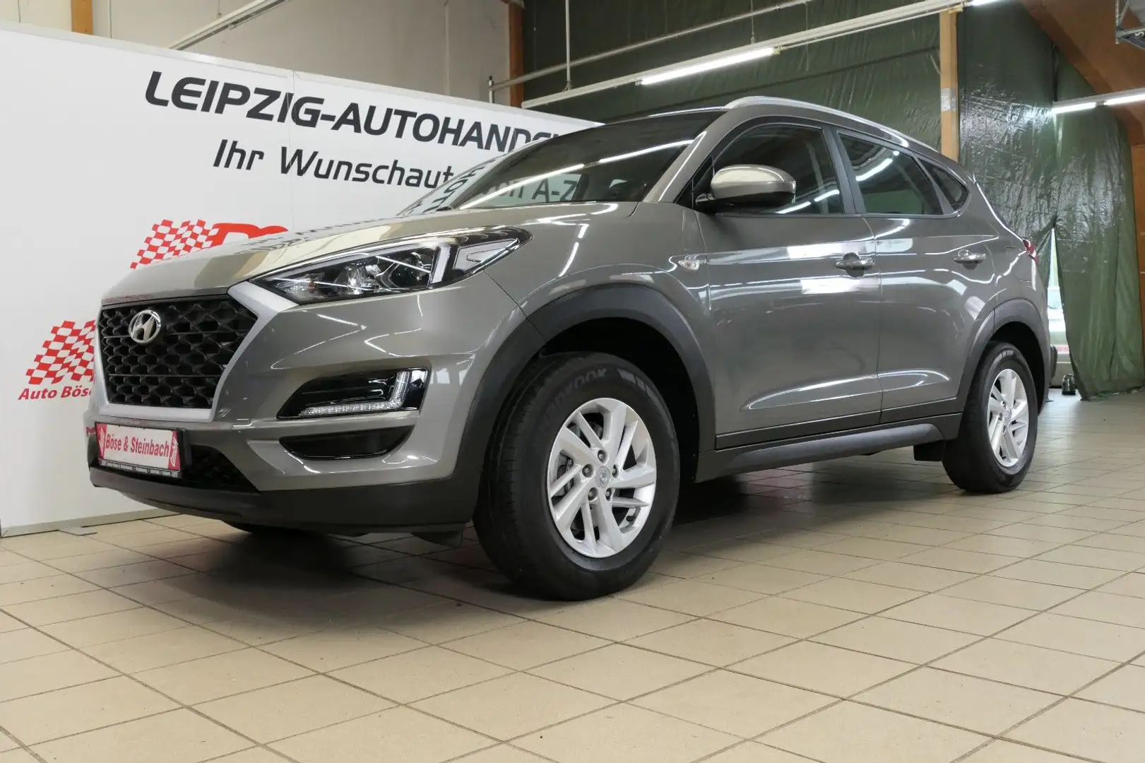 Hyundai TUCSON Select 2WD*NAV*AHK*KAM*PDC*SHZ*GRA* Grau - 1