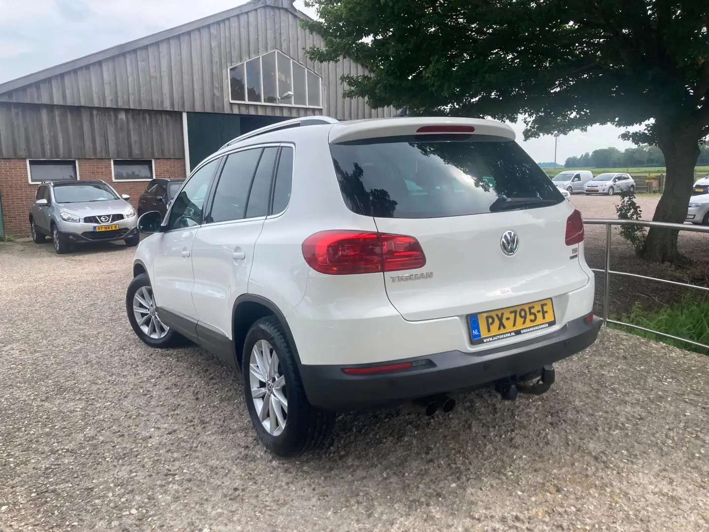 Volkswagen Tiguan 1.4 TSI Sport&Style | Cruise + Clima nu € 7.975,-! Wit - 2