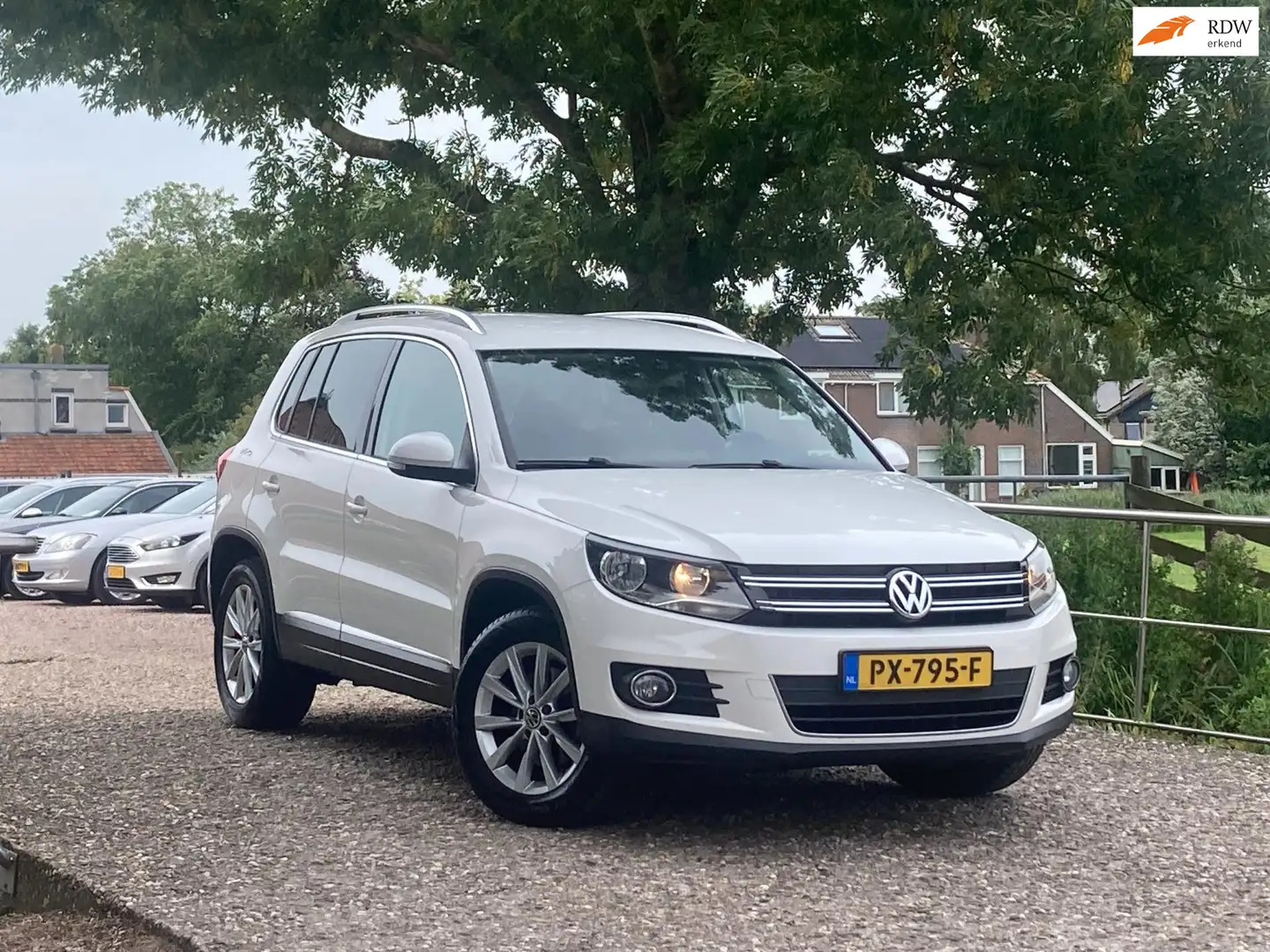 Volkswagen Tiguan 1.4 TSI Sport&Style | Cruise + Clima nu € 7.975,-! Wit - 1
