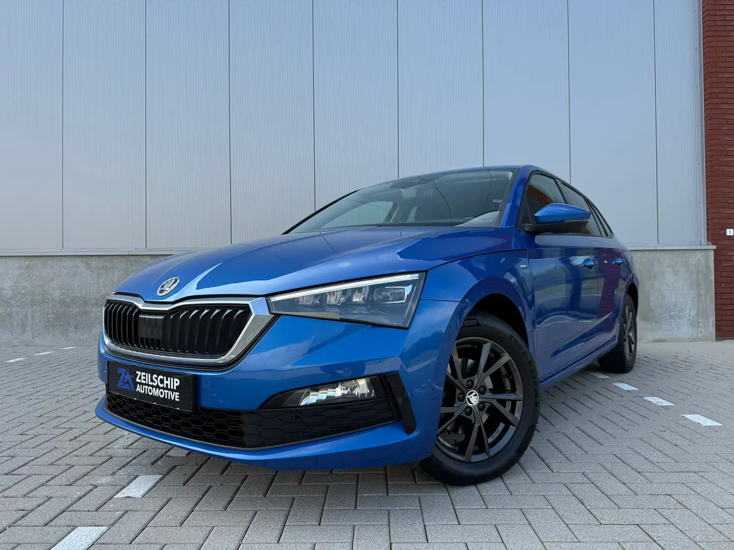 Skoda Scala 1.5 TSI Sport Business 150 PK DSG|Virtual|Camera| Blauw - 1