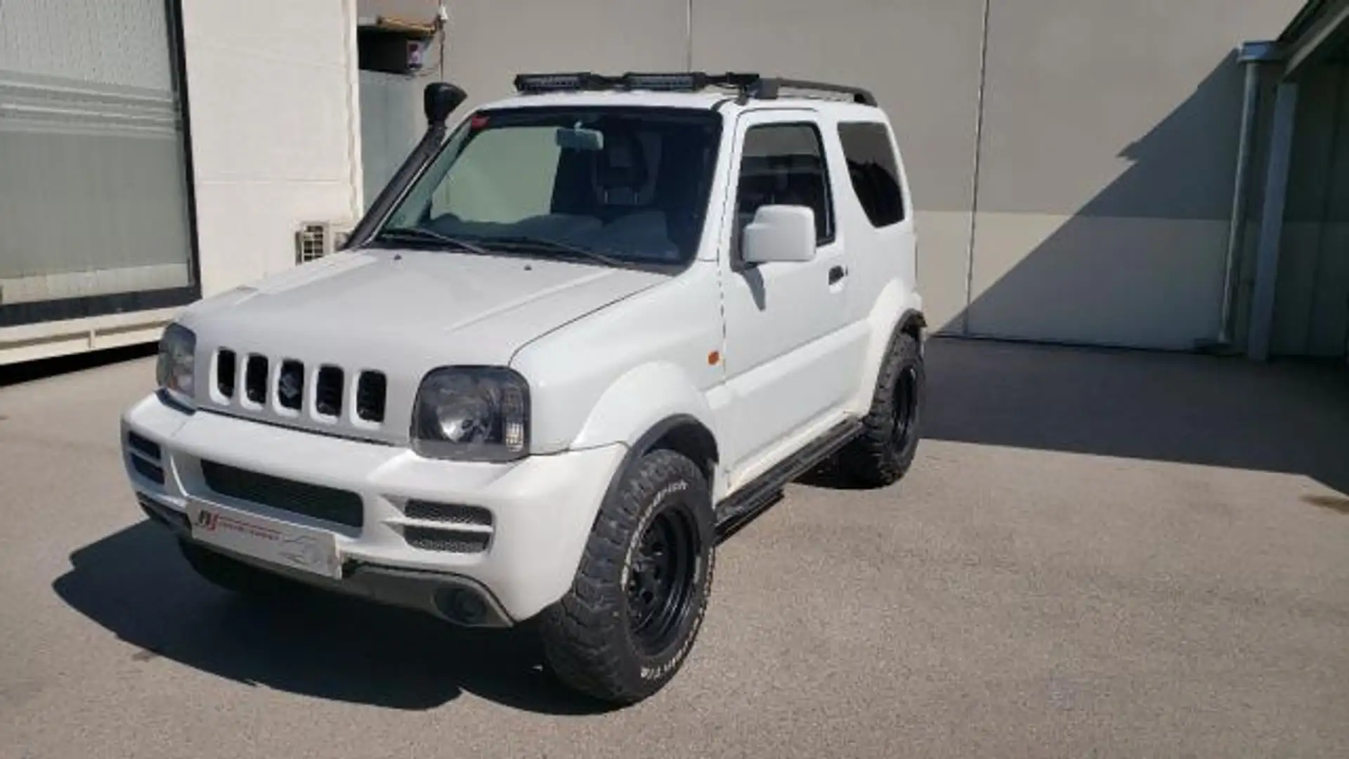 Suzuki Jimny 1.3i 16V 4WD JLX Weiß - 1