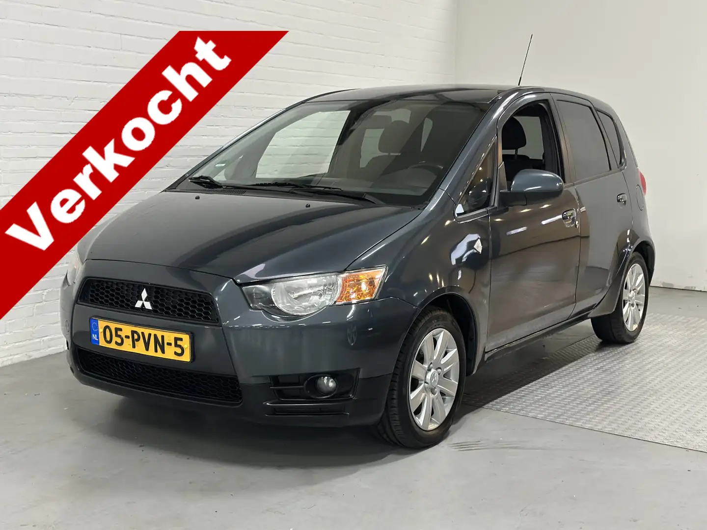 Mitsubishi Colt 1.3 Edition Two AIRCO / CRUISE /TREKHAAK Dealer on Grau - 1