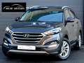 Hyundai TUCSON 1.6 GDi 2WD / Navi / Bluetooth / Camera / Garantie Gris - thumbnail 1