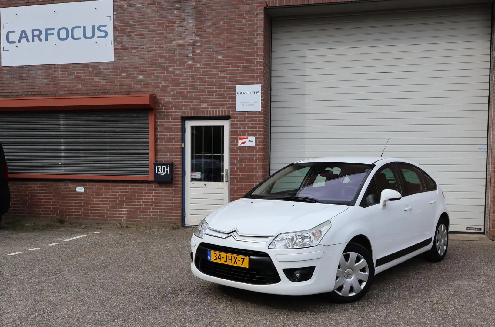 Citroen C4 1.6 VTi Prestige NAP 2e eigenaar Airco Cruise NAP Wit - 1