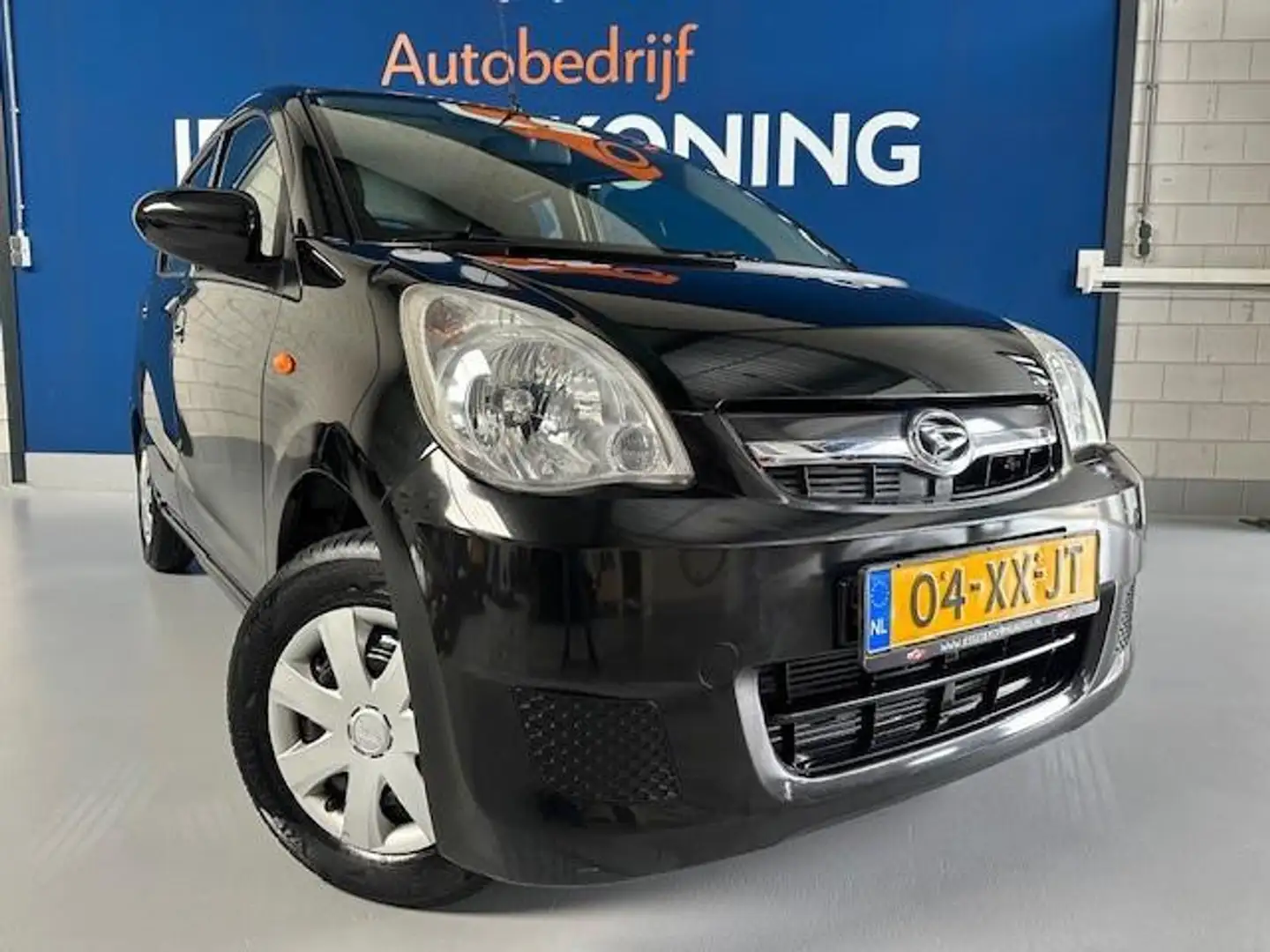 Daihatsu Cuore 1.0 Premium,5 deurs,NAP met 105.734 km. APK tot 01 Negro - 2