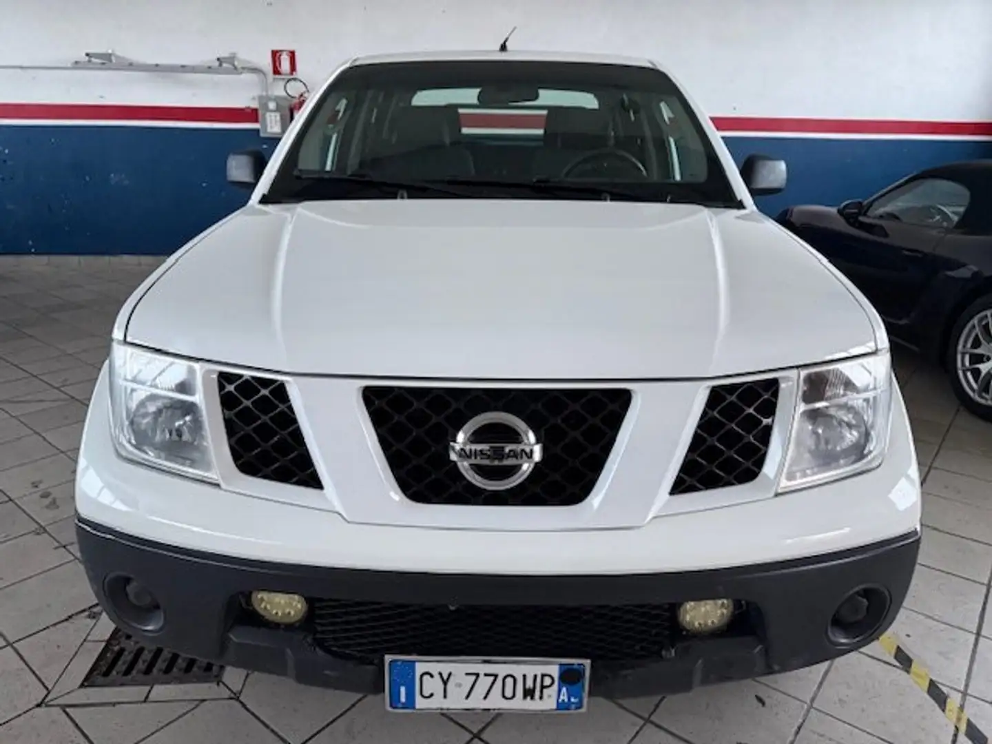 Nissan Navara Navara 2005 d.cab 2.5 dci XE 174cv Blanc - 2
