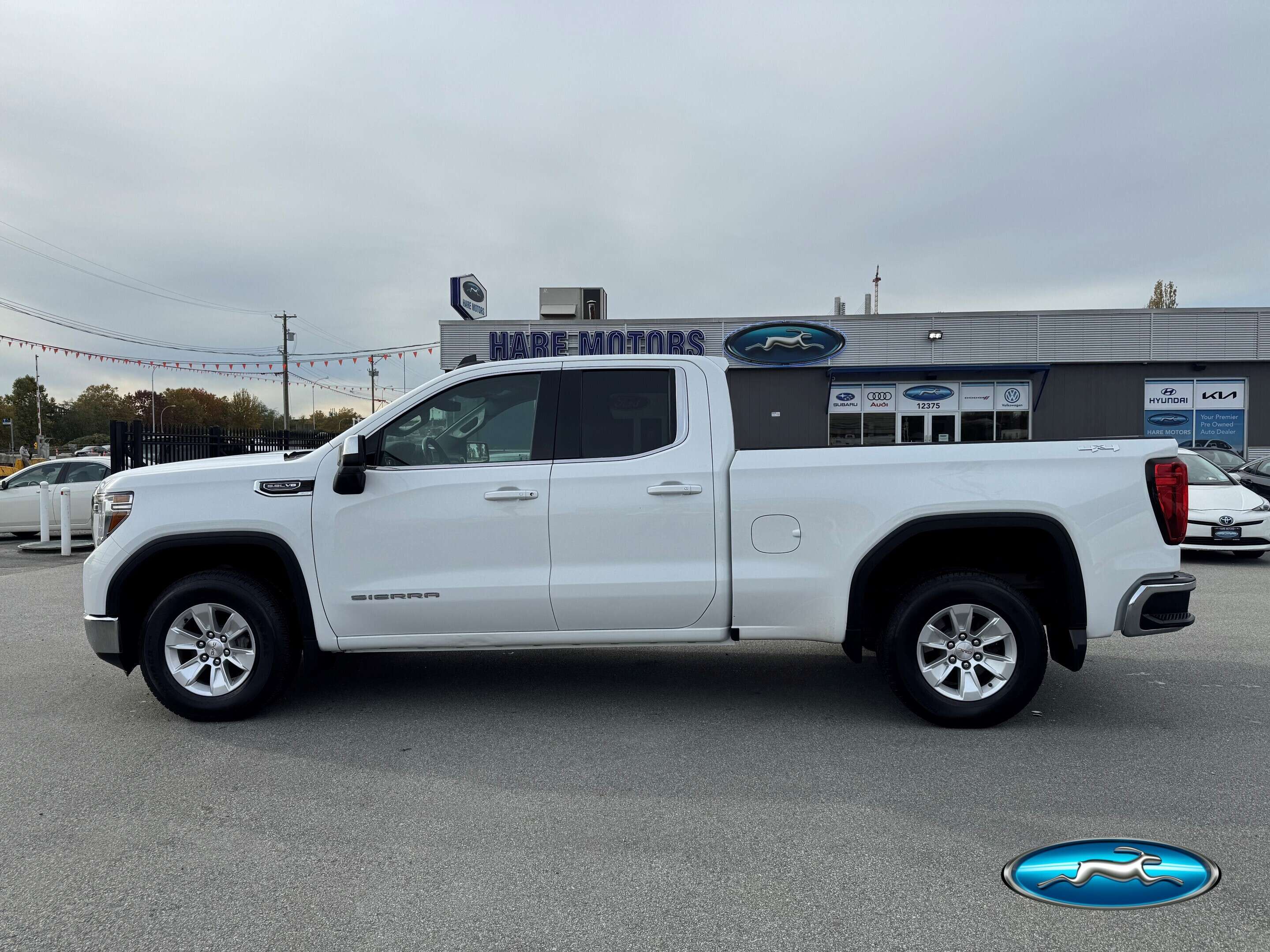 White 2021 GMC Sierra 1500 SLE Double Cab 4WD Pickup Truck Four-Wheel Drive Automatic
