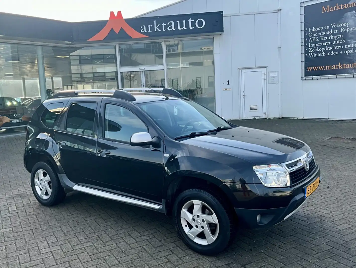 Dacia Duster 1.6 Lauréate 2wd Cruise Airco Trekhaak PDC Nero - 1
