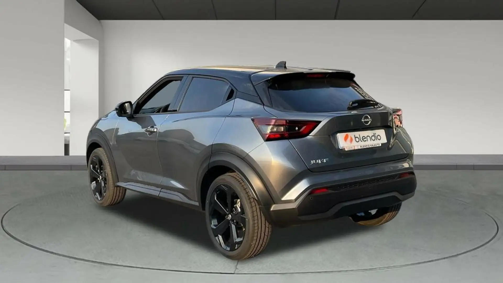 Nissan Juke 1.0 DIG-T Tekna 4x2 84kW Grijs - 2
