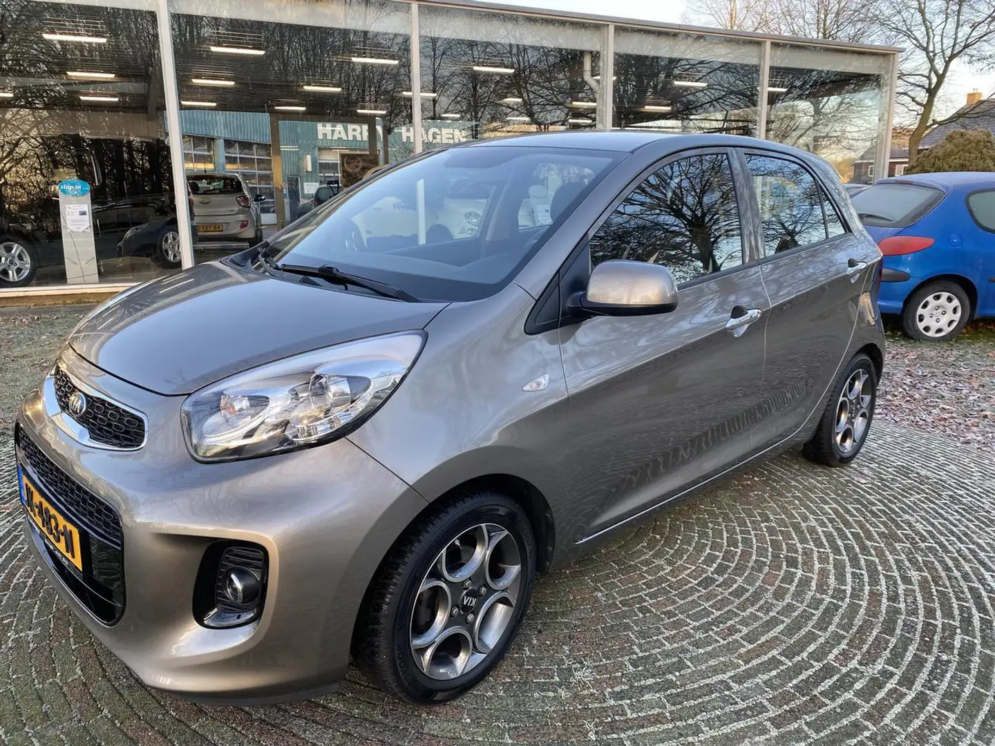 Kia Picanto 1.0 CVVT COMFORTPLUSLINE 5DRS NL AUTO. Grau - 1