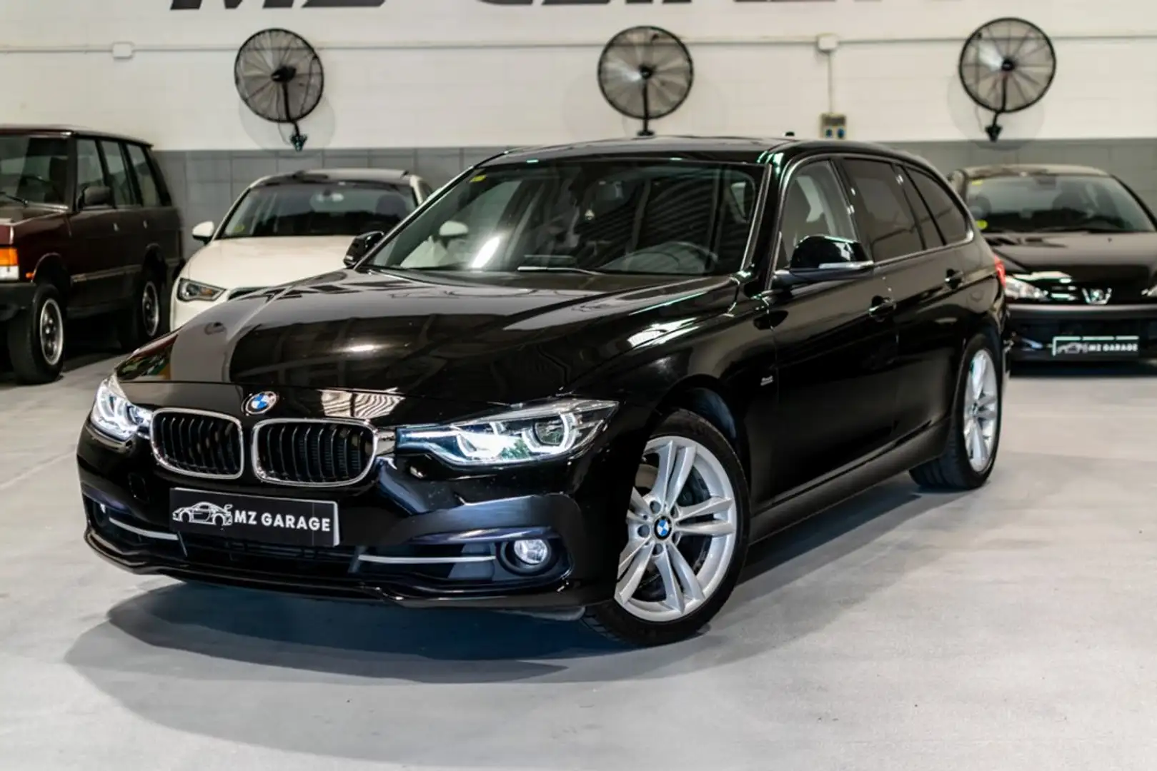 BMW Active Hybrid 3 330d xDrive Touring Zwart - 1