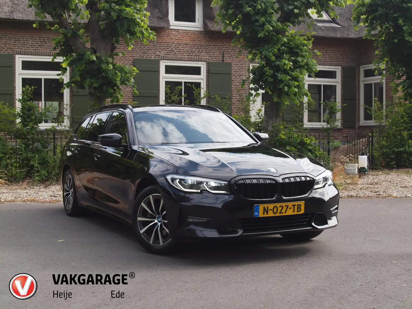 BMW 320 3-serie Touring 320e Business Edition Plus | Apple Zwart - 1