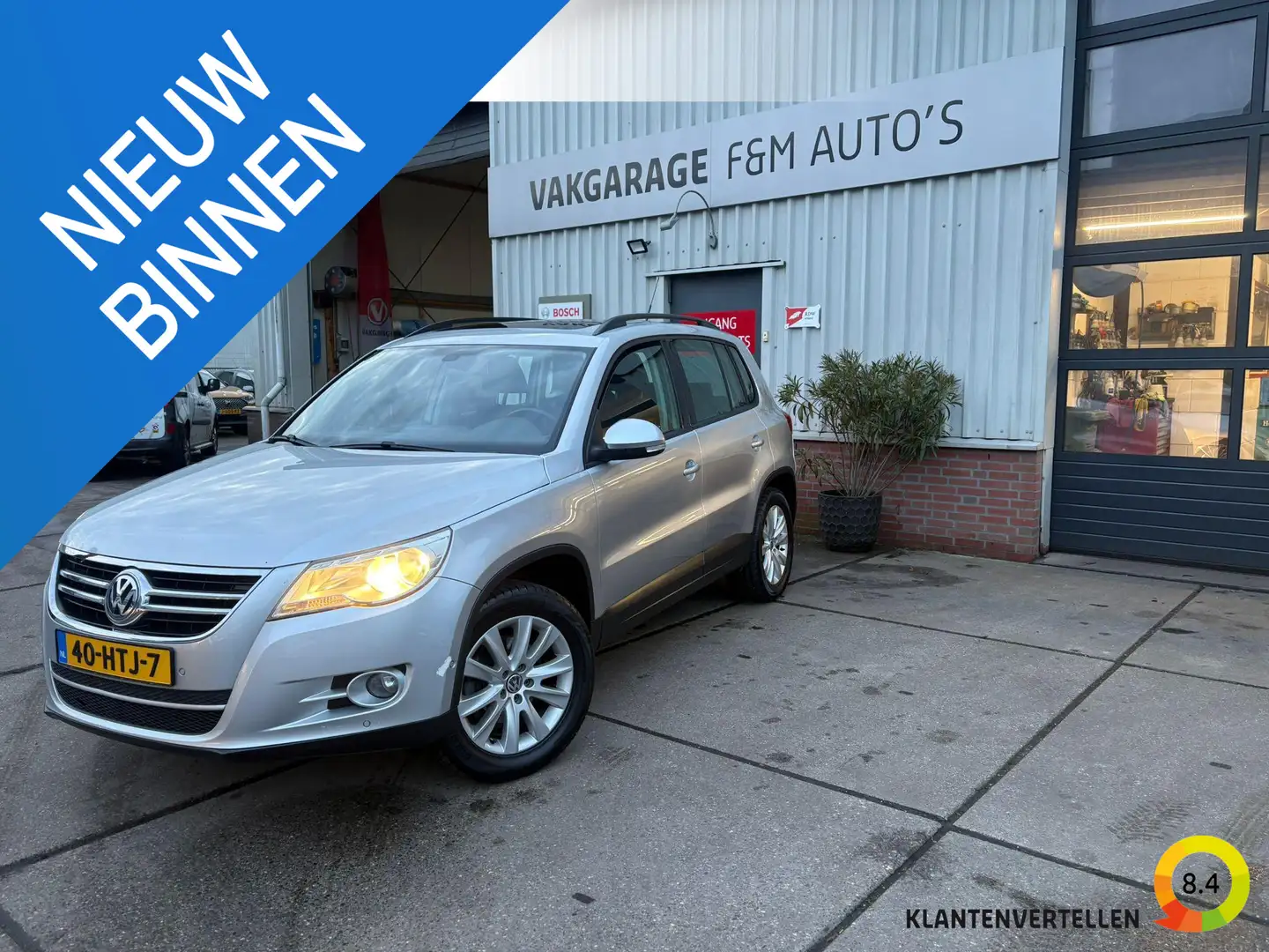 Volkswagen Tiguan 1.4 TSI Comfort&Design Airco, trekhaak, pano, navi Grau - 1