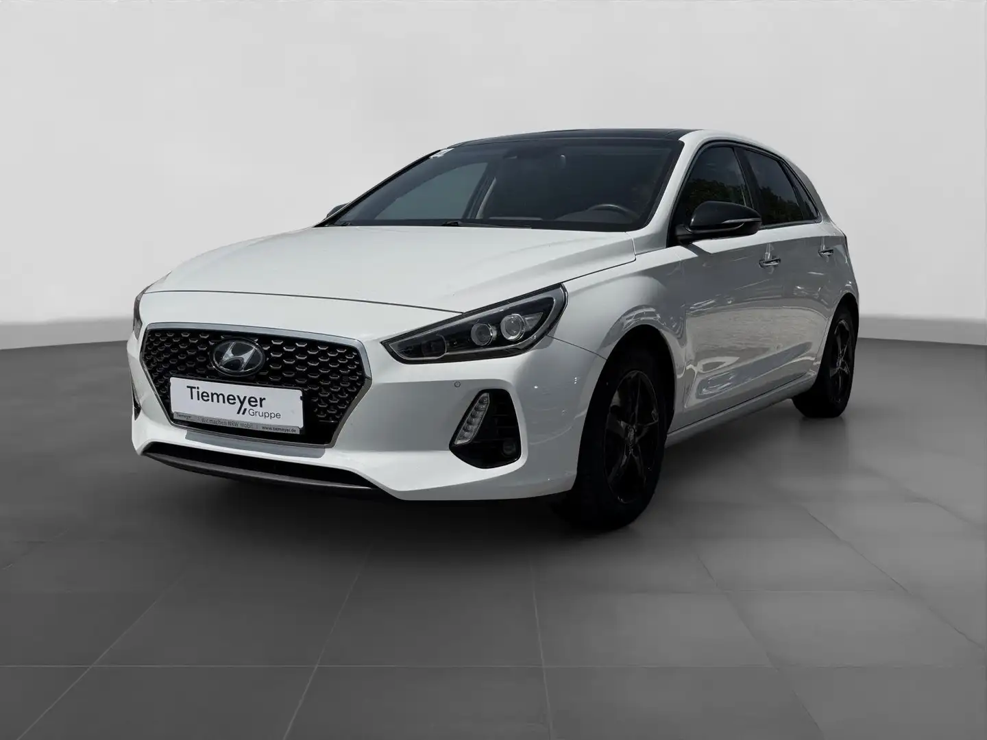 Hyundai i30 1.4 T-GDI PREMIUM PANO NAVI LED LM Wit - 1