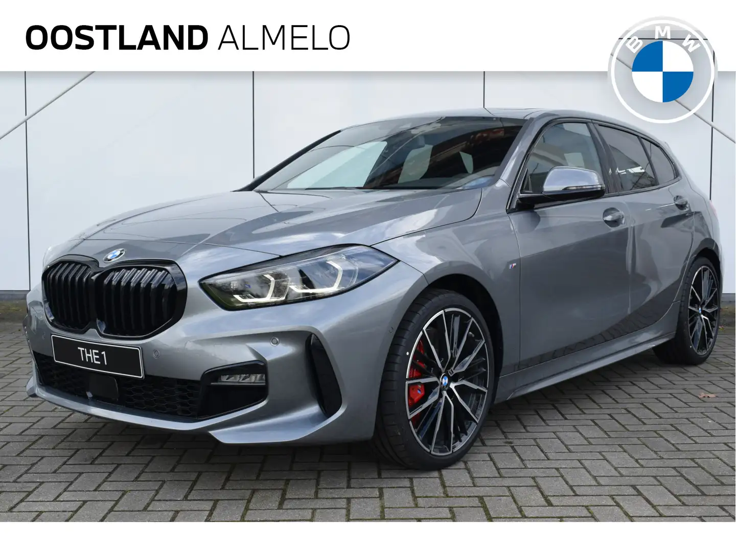 BMW 118 1-serie 118i High Executive M Sport Automaat / Pan Grijs - 1