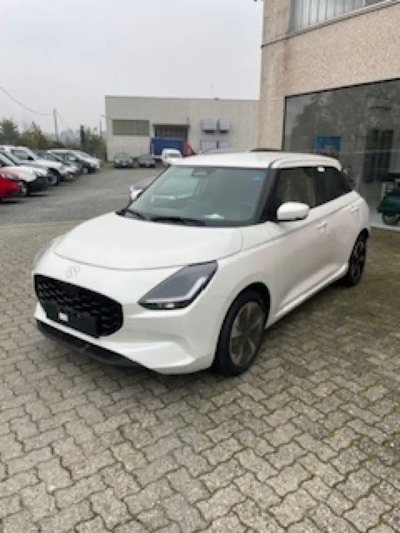 Suzuki Swift 1.2 Hybrid Top 2wd NUOVO DA IMMATRICOLARE Arancione - 1