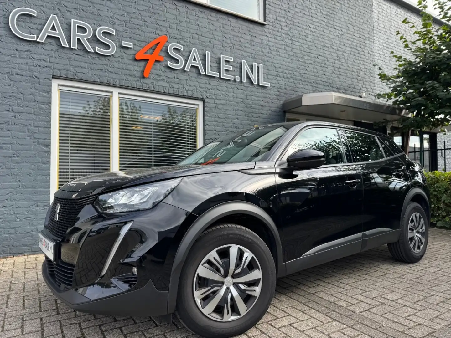 Peugeot 2008 1.2 Active Business + Led + Camera + Nav + Car-pla Schwarz - 1
